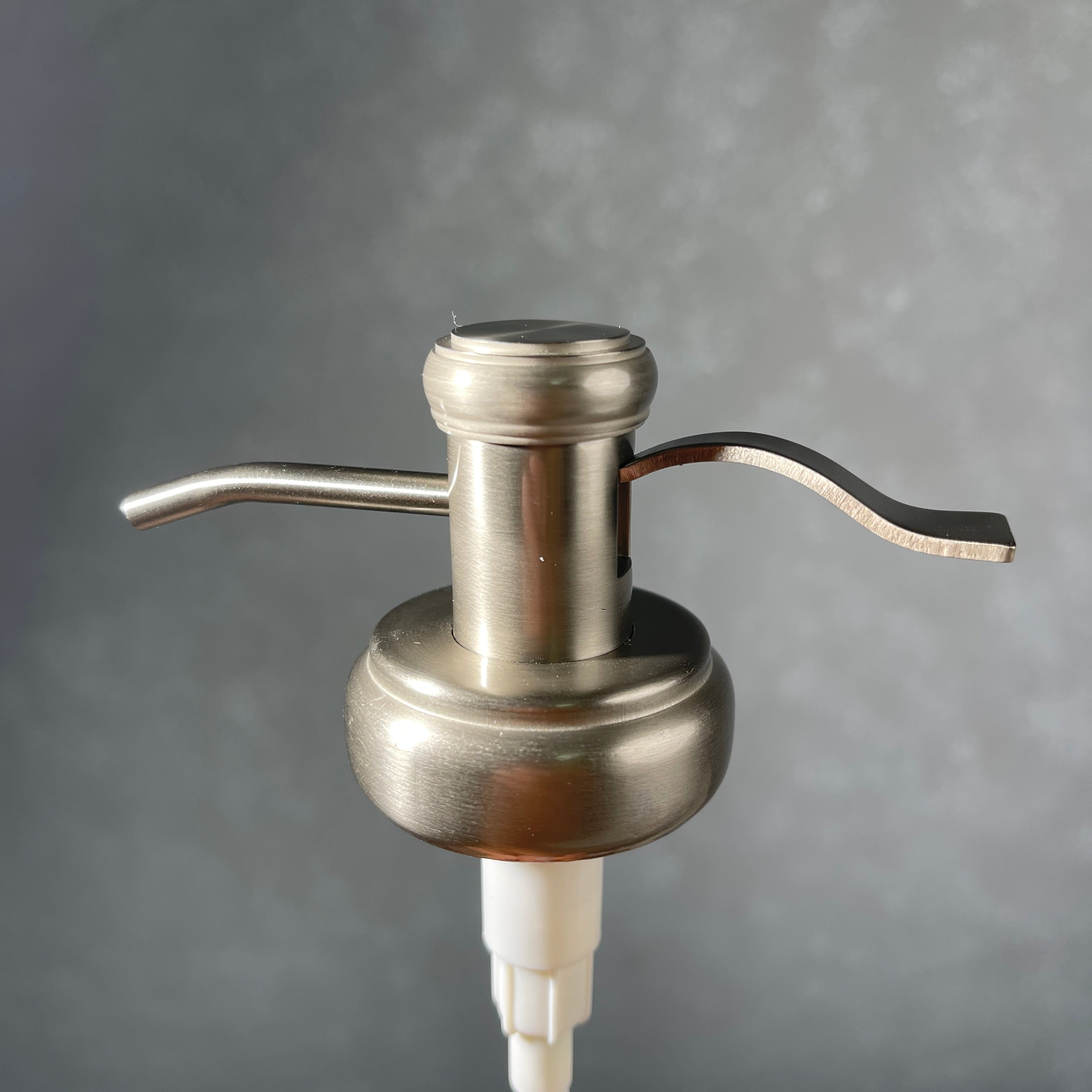 water well style soap pump in brushed nickel stainless  finish 