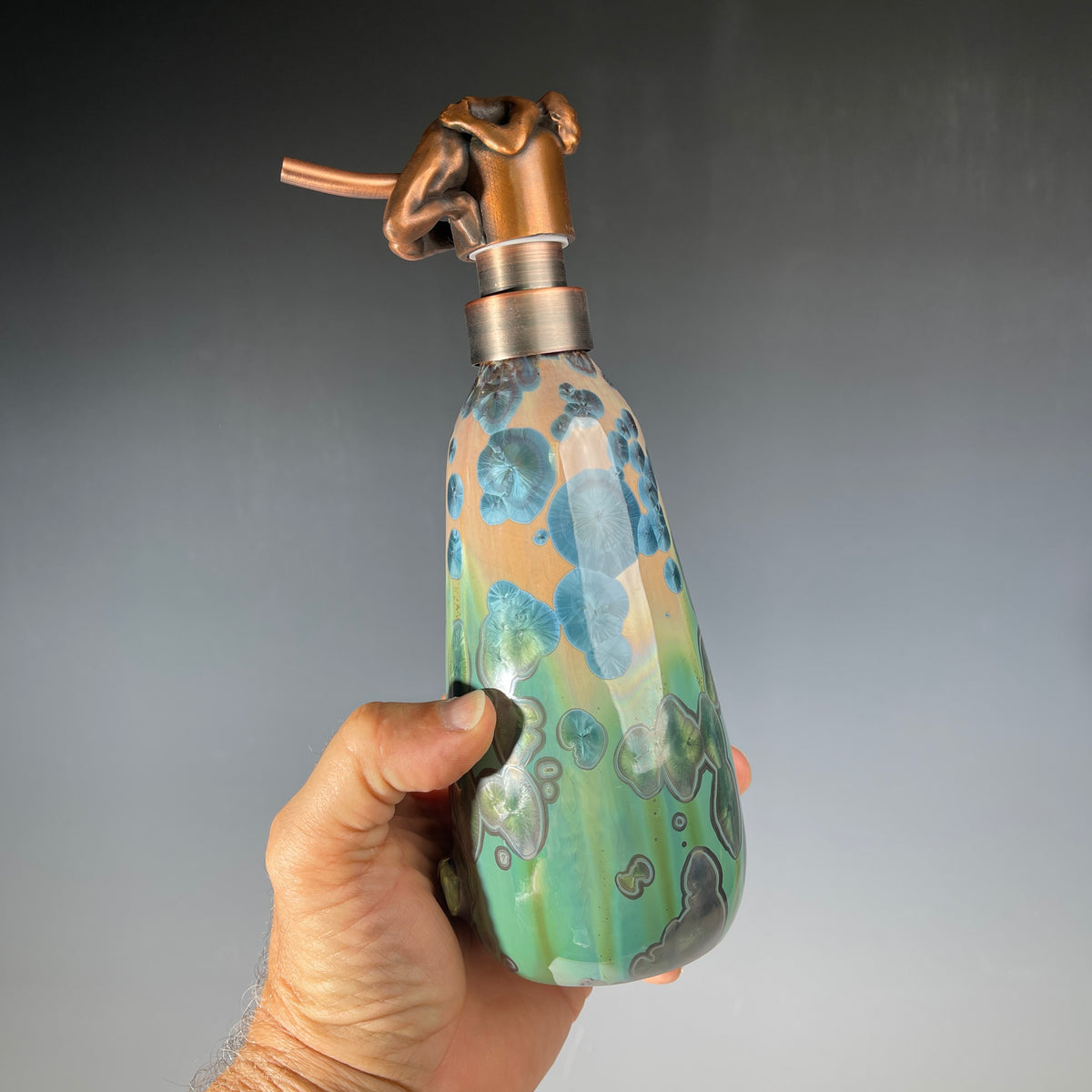 happy man soap pump in hand to show scale