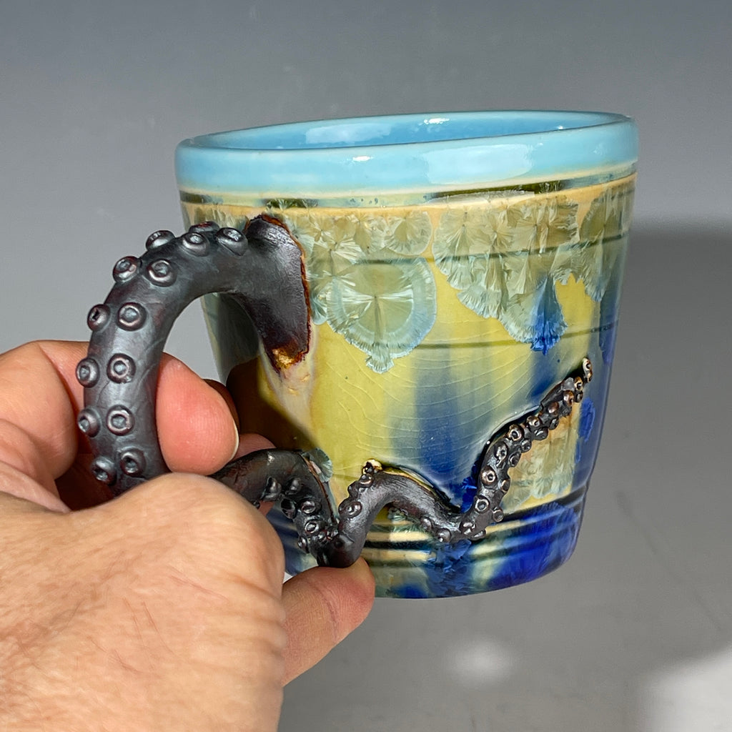 Octo-cup octopus tentacled cup with green blue sparking crystalline glaze by Adam & Hong Rubinstein 
