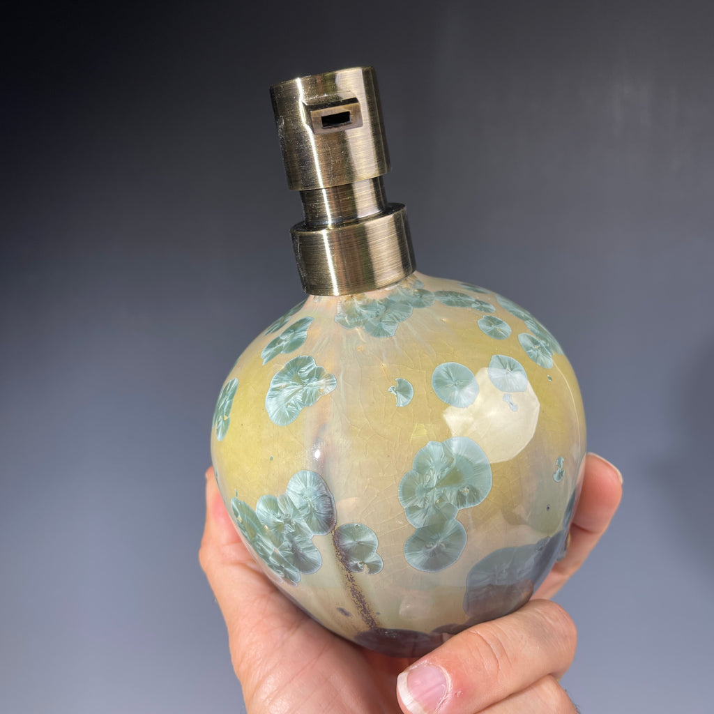 handmade ceramic soap dispenser with amazing crystalline formations in the glaze in green hues