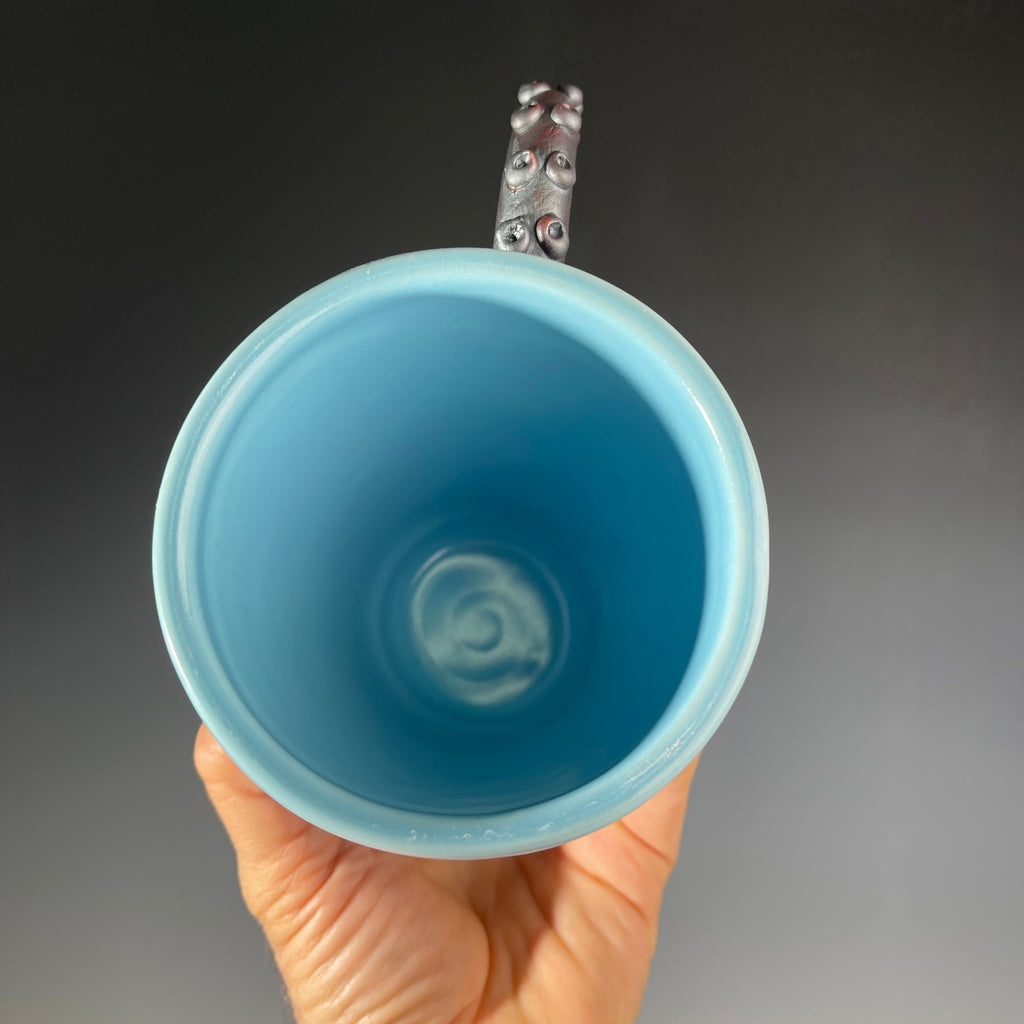Octopus tentacled mug in deep ocean blue with sparkling crystals by Hong & Adam Rubinstein