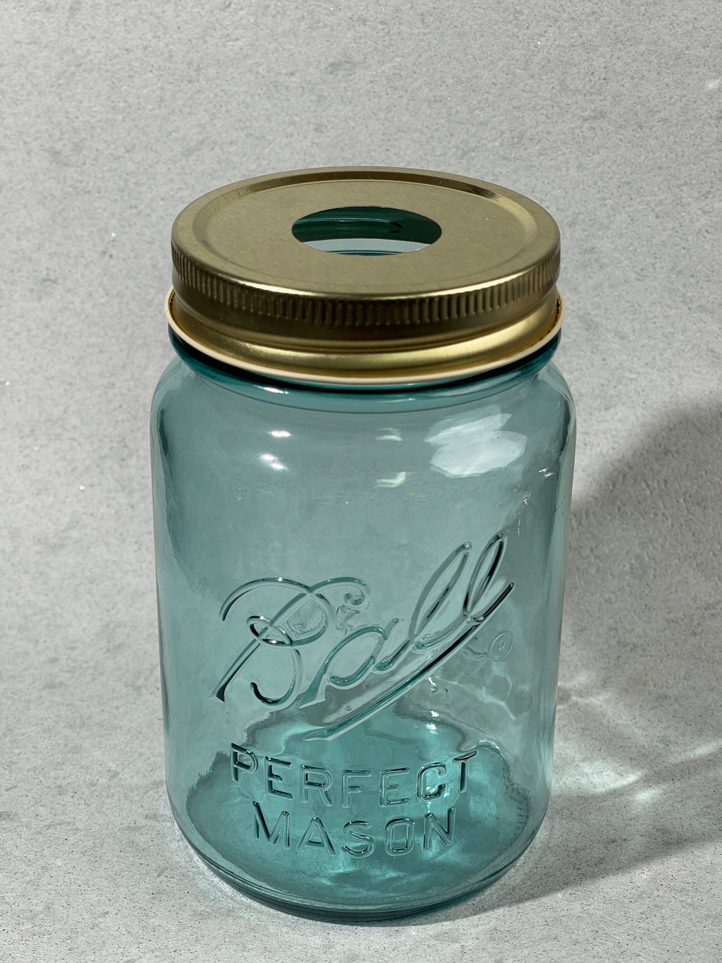 mason jar with gold brass adapter lid