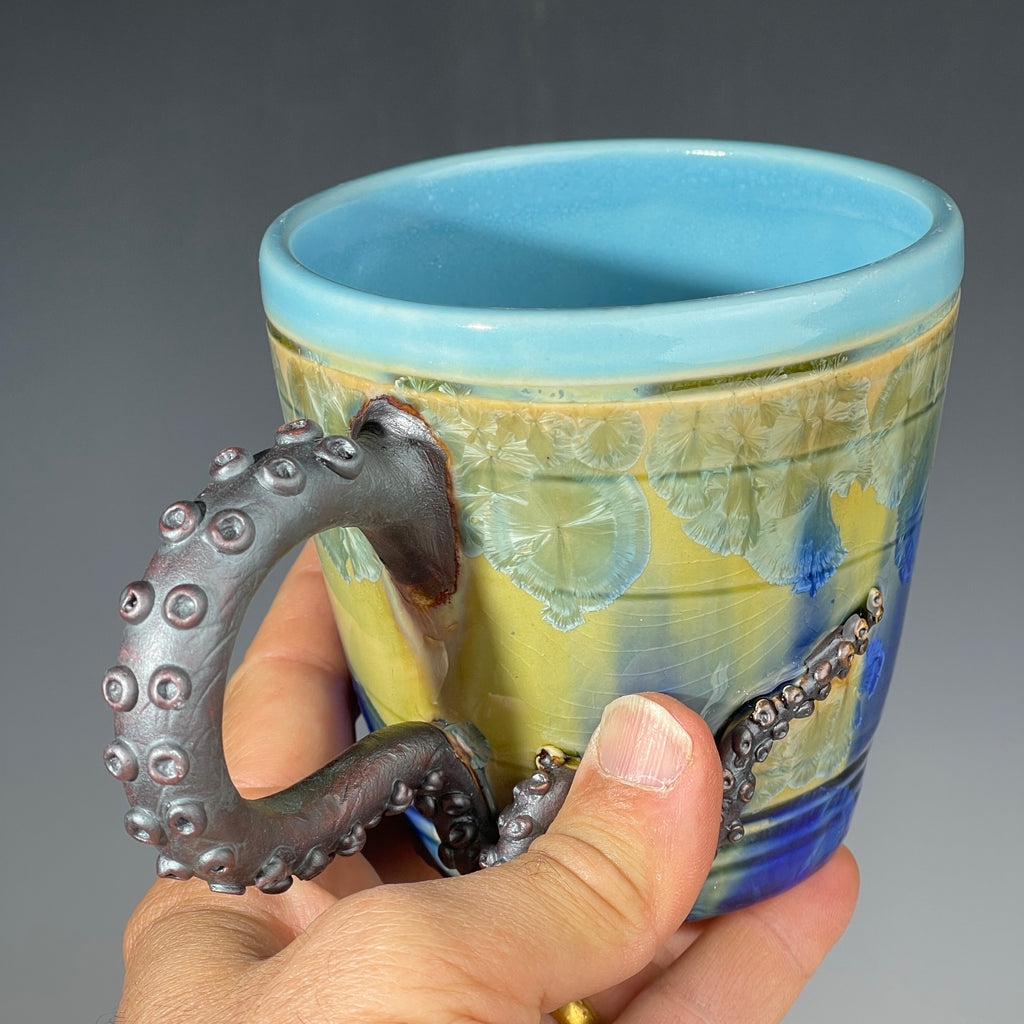 Octo-cup octopus tentacled cup with green blue sparking crystalline glaze by Adam & Hong Rubinstein 