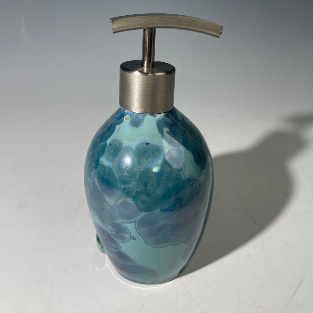 unique art soap dispenser by Hong Rubinstein in an ocean hued sparkling refractive  macro crystalline glaze