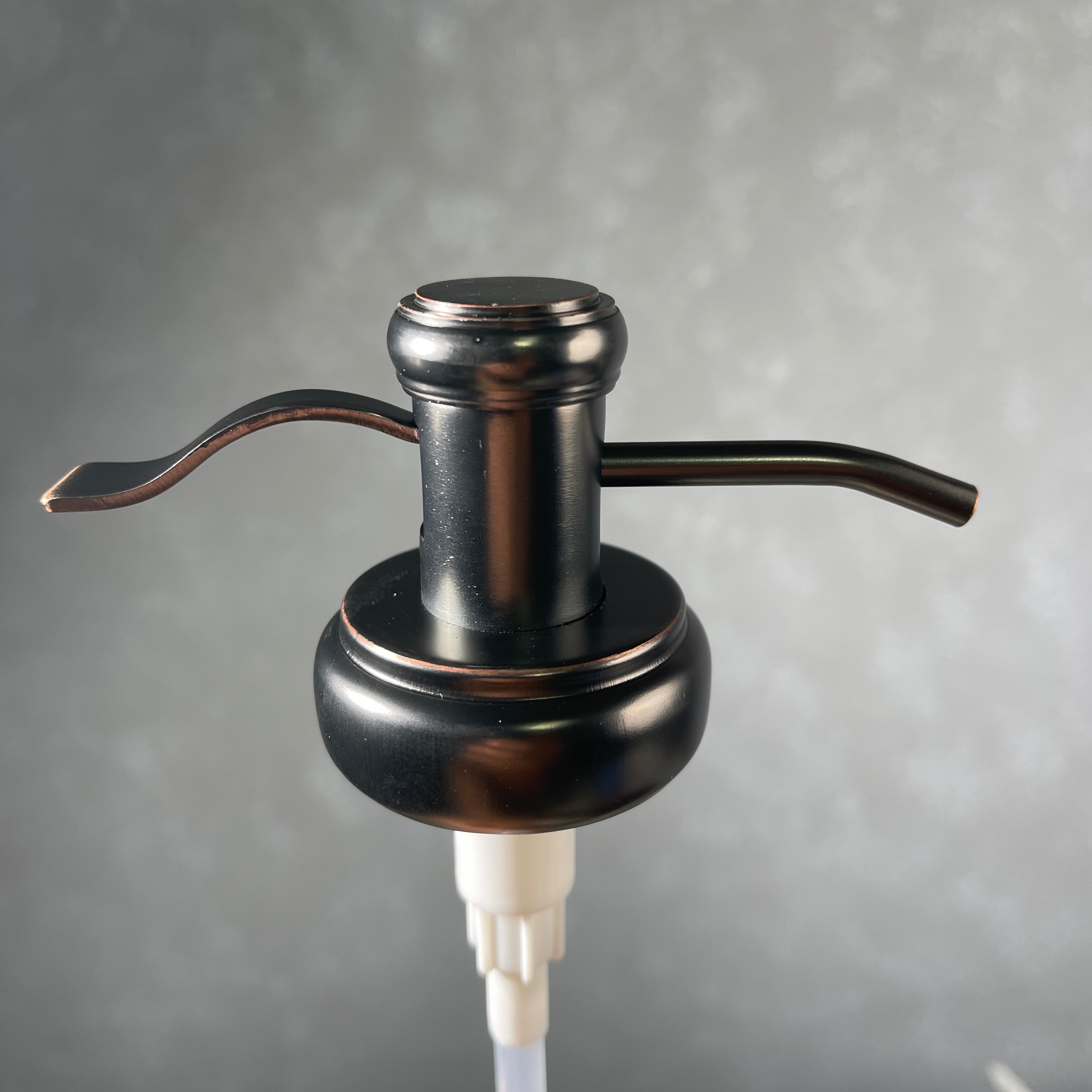 water well style soap pump in oil rubbed bronze finish