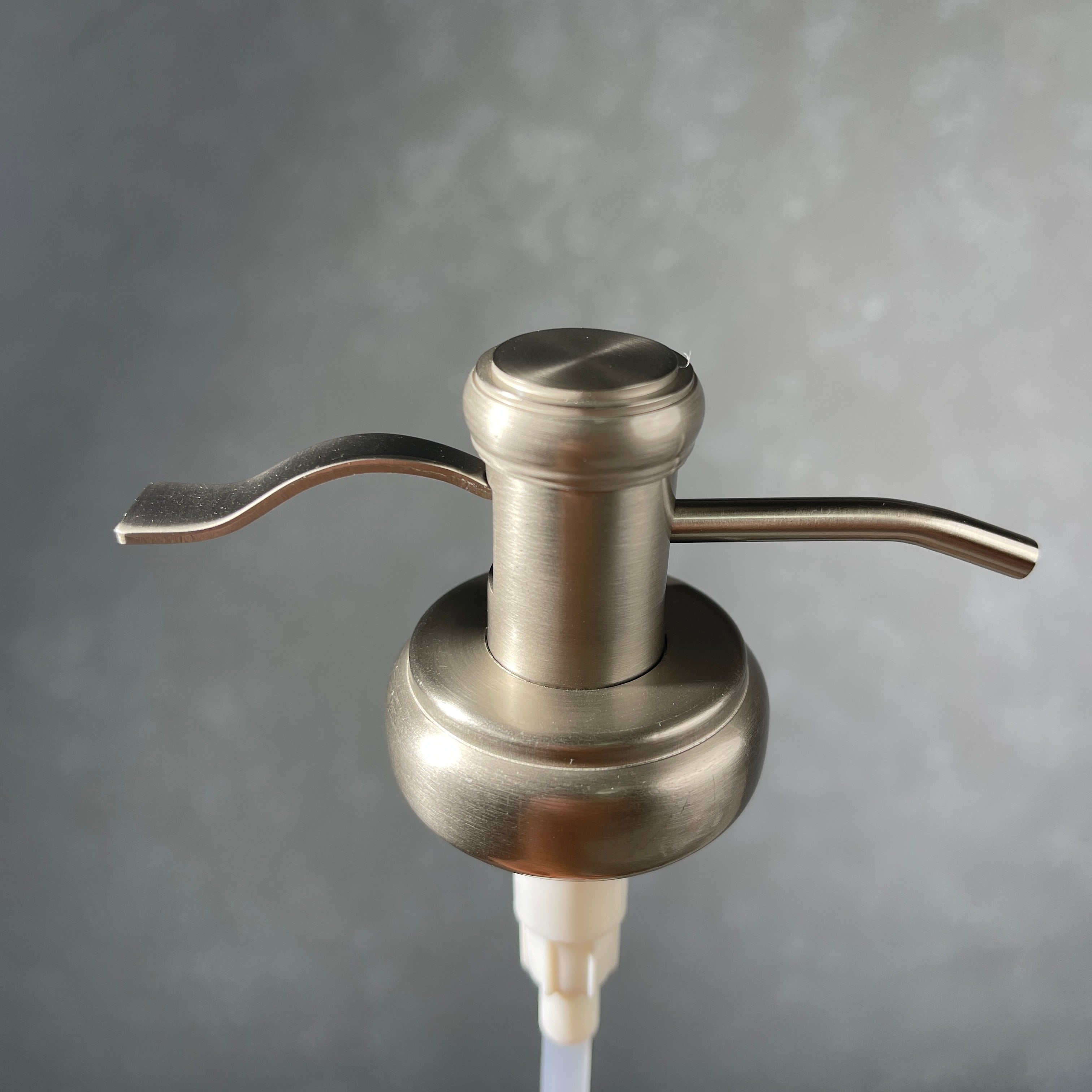 water well style soap pump in brushed nickel stainless  finish 