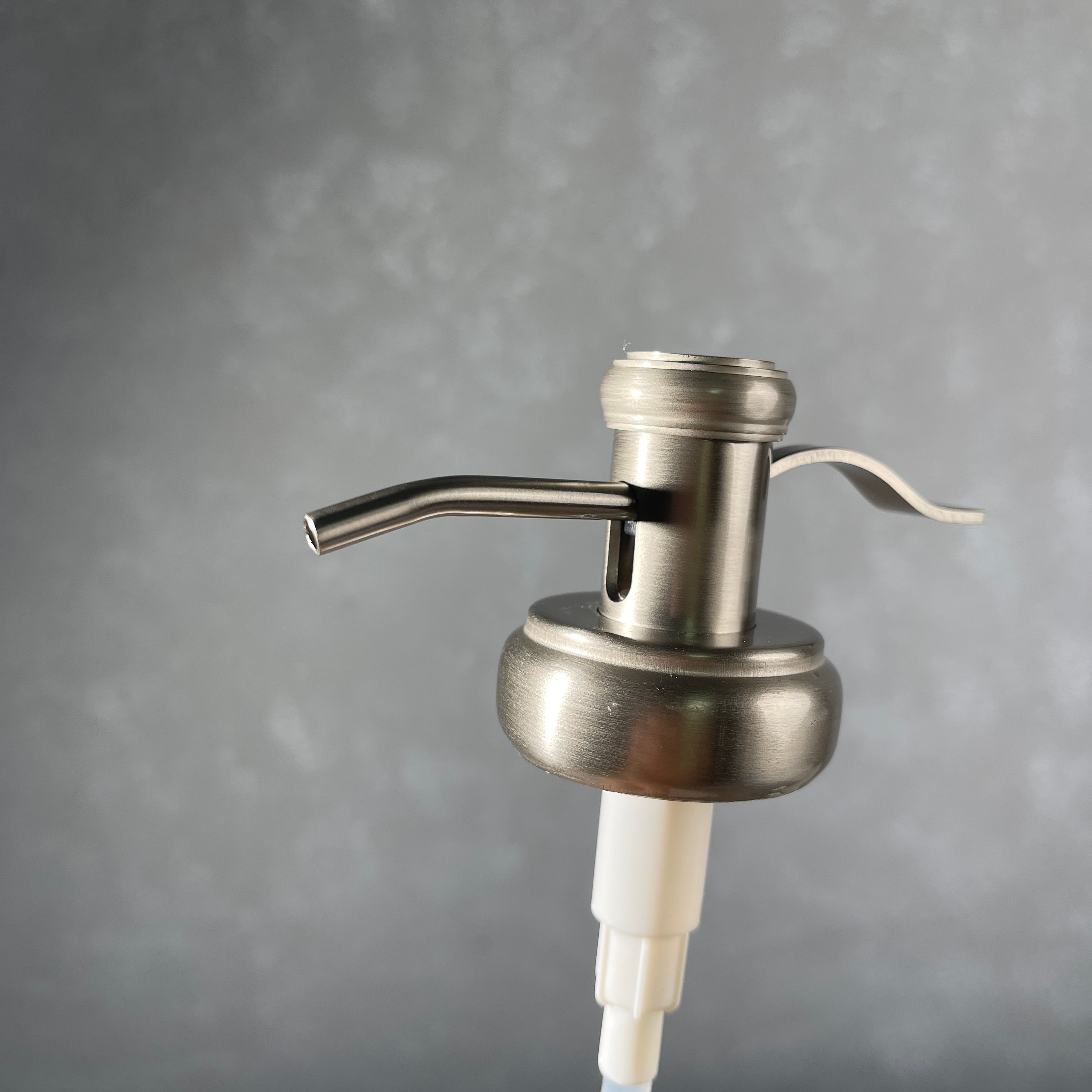 water well style soap pump in brushed nickel stainless  finish 