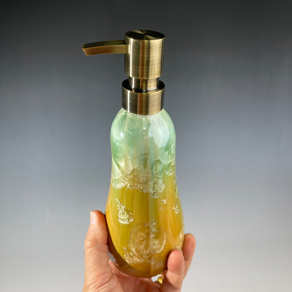 artistic soap dispenser in aqua fade to golden sunrise toned crystalline glaze