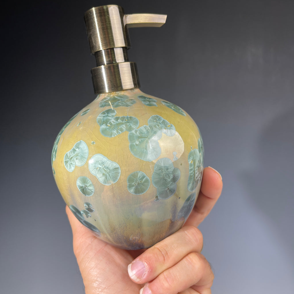 handmade soap dispenser with amazing crystalline formations in the glaze in green hues