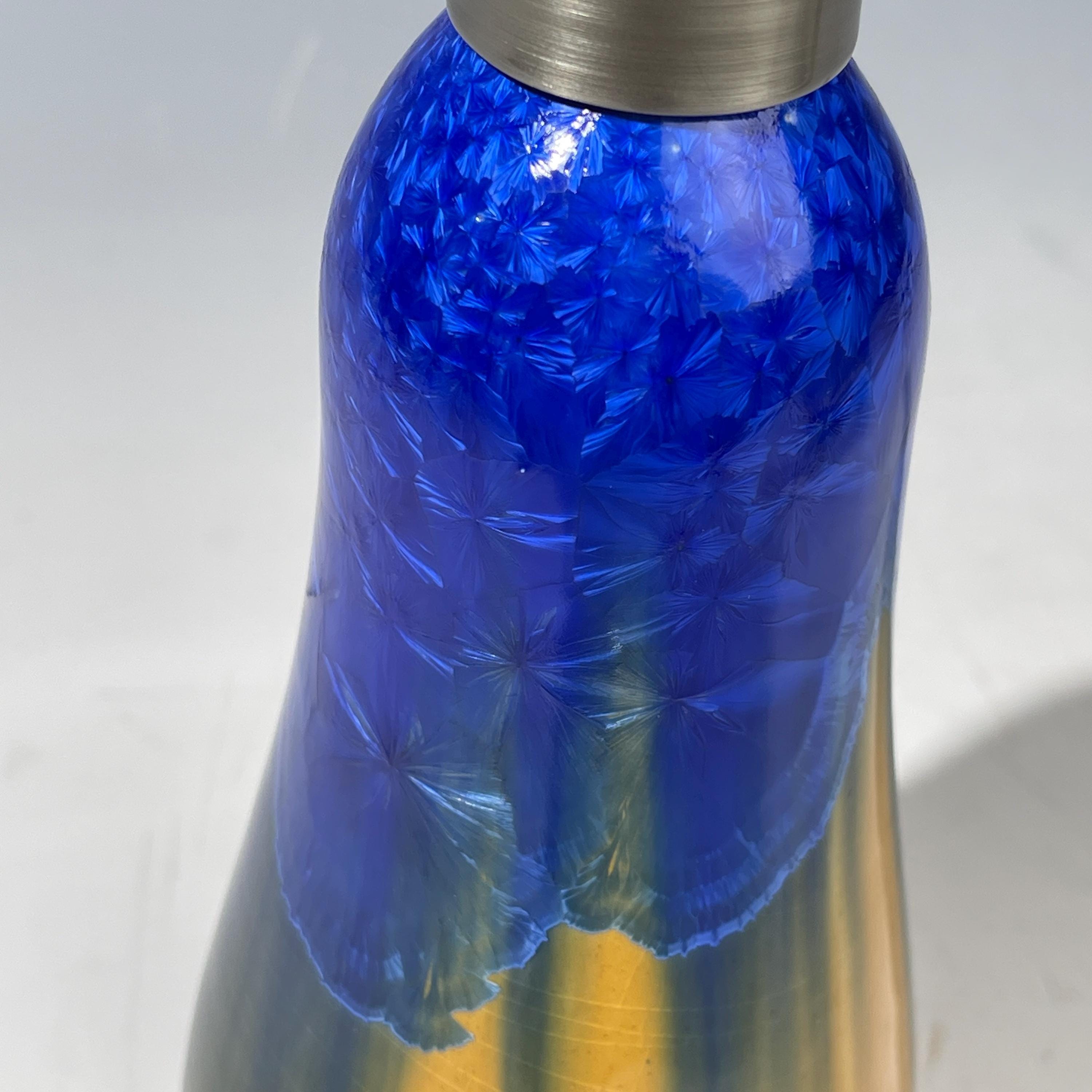 A refractive orange dreams of blue soap pump soap or lotion dispenser