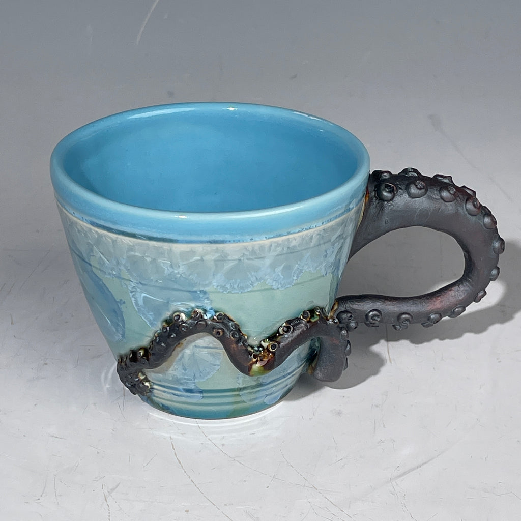 Octo- cup tentacled in Caribbean blue with sparkling crystals by Hong & Adam Rubinstein