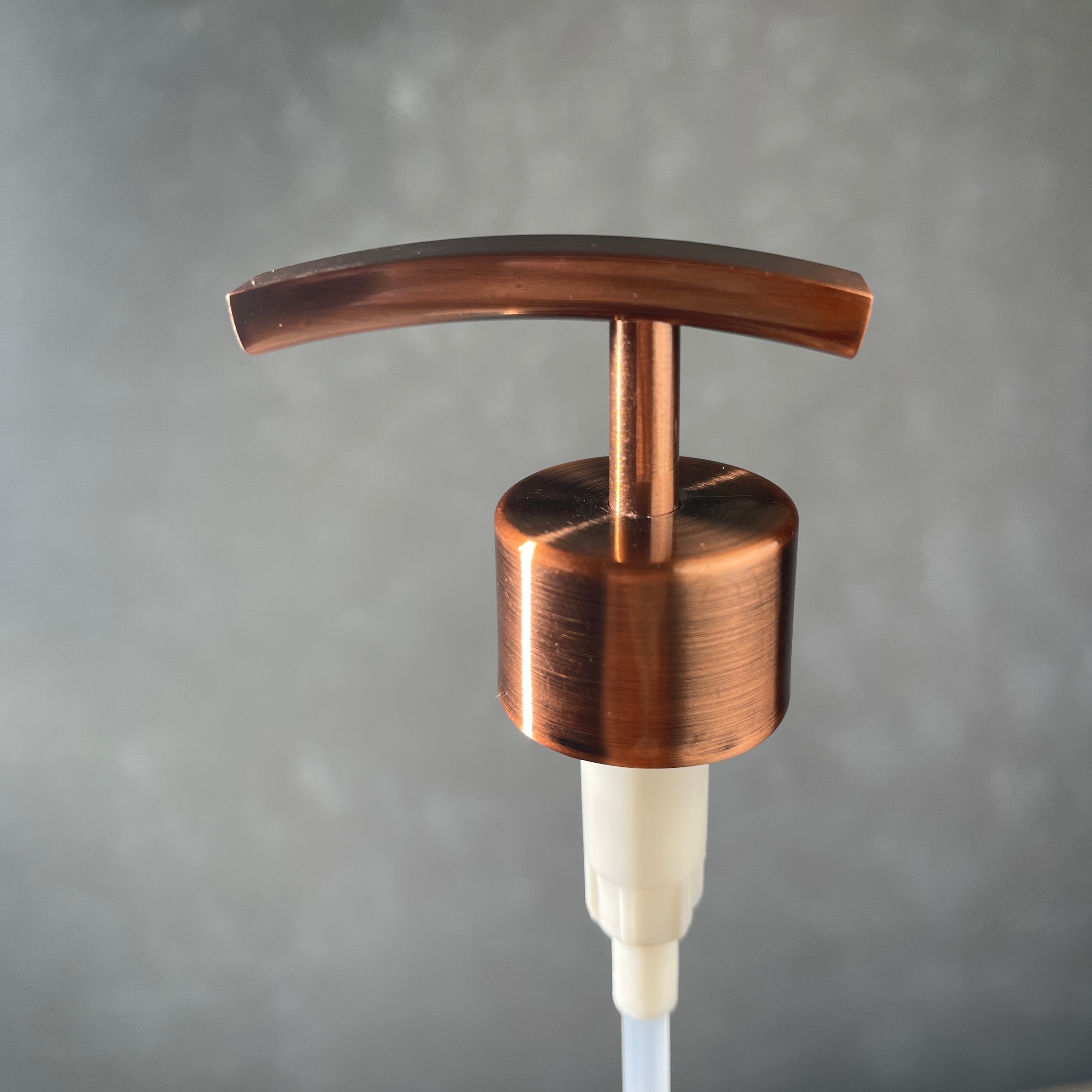 Copper finish metal soap pump top