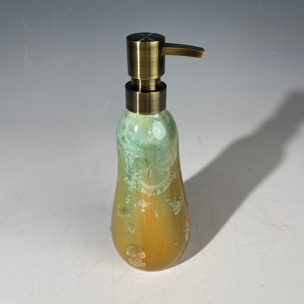 artistic soap dispenser in aqua fade to golden sunrise toned crystalline glaze