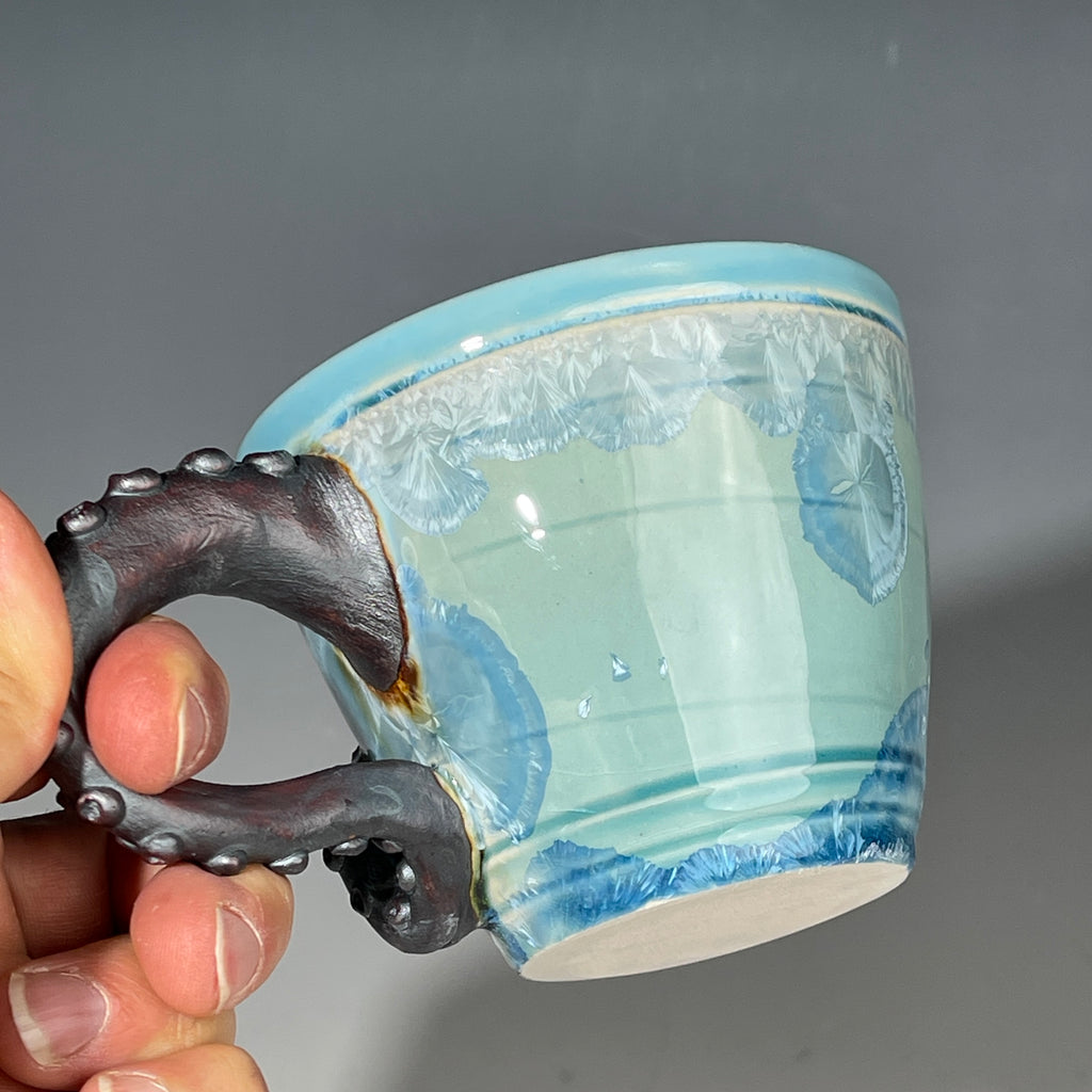 Octo- cup tentacled in Caribbean blue with sparkling crystals by Hong & Adam Rubinstein