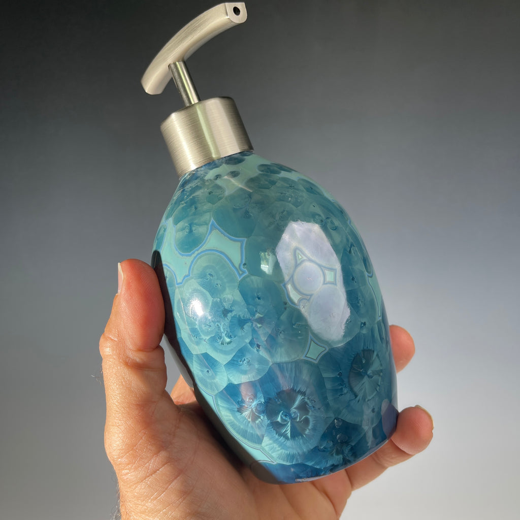 unique art soap dispenser by Hong Rubinstein in an ocean hued sparkling refractive  macro crystalline glaze