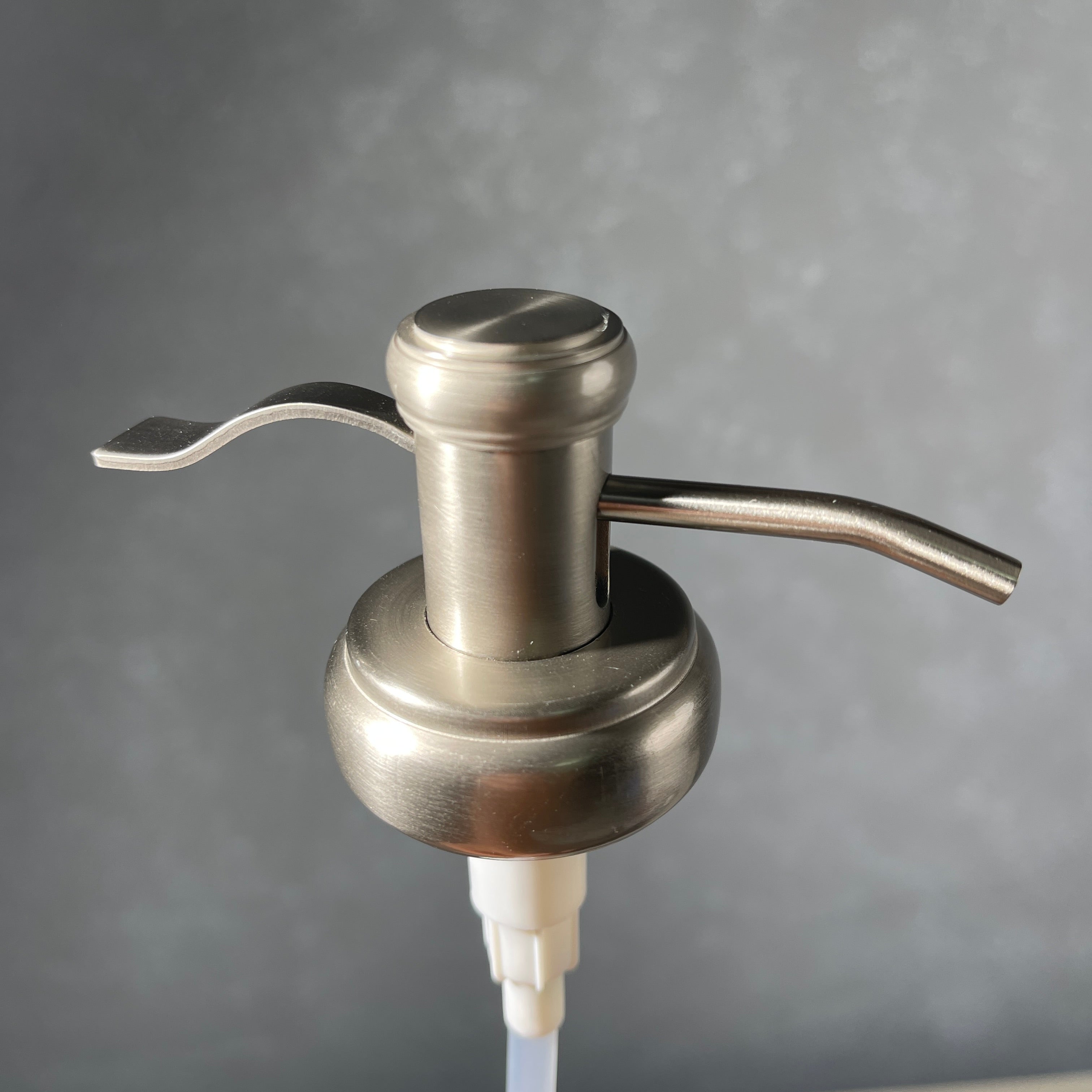 water well style soap pump in brushed nickel stainless  finish 