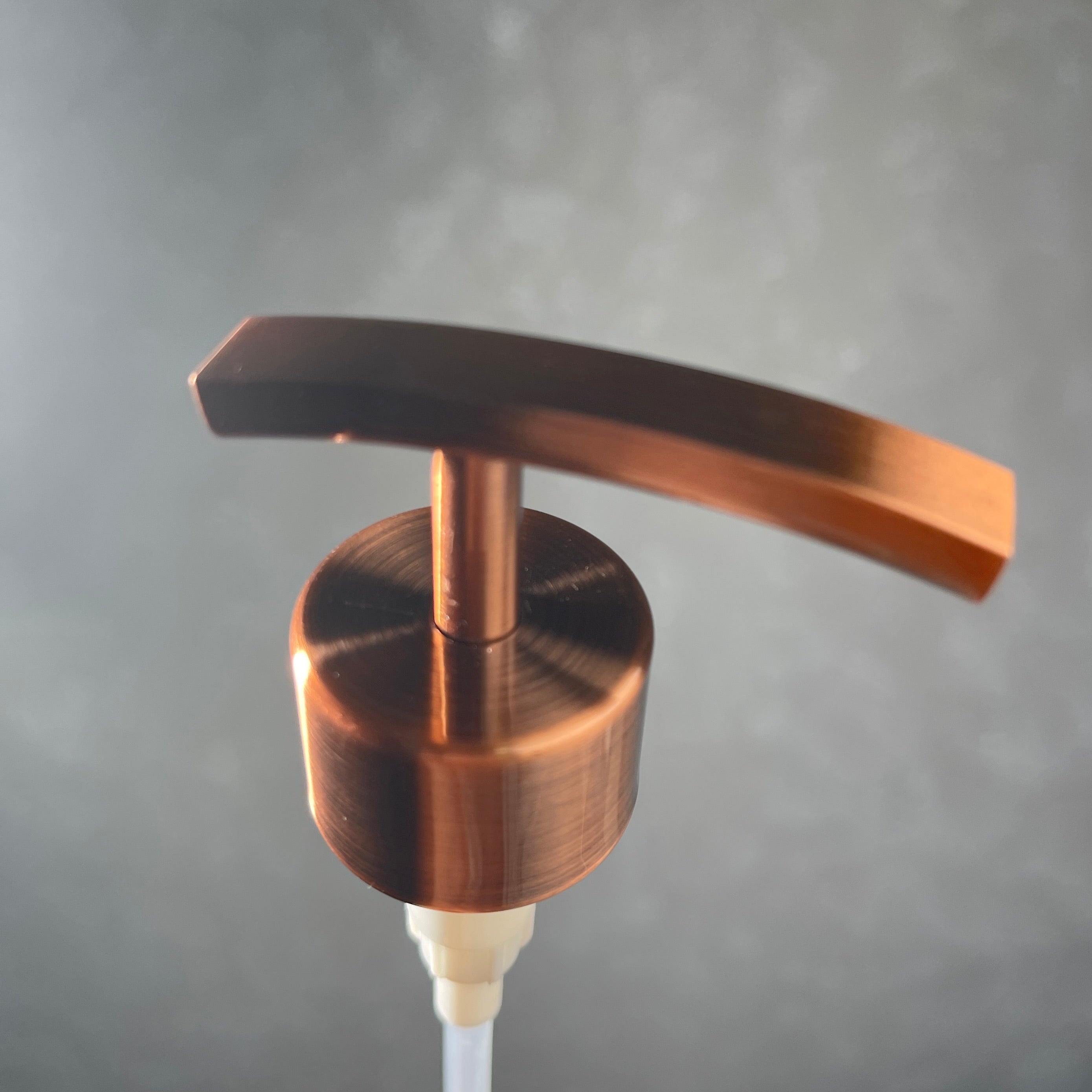 Copper finish metal soap pump top