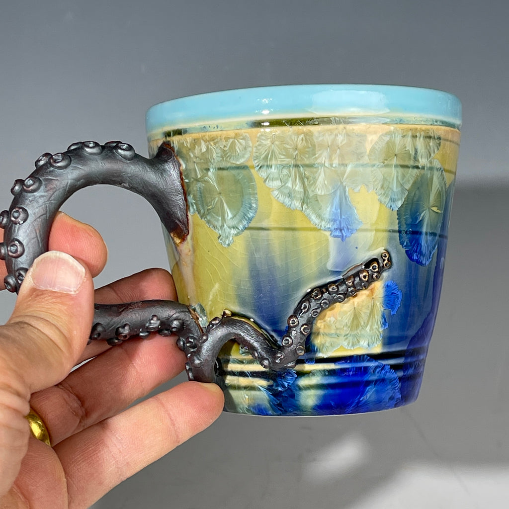 Octo-cup octopus tentacled cup with green blue sparking crystalline glaze by Adam & Hong Rubinstein 