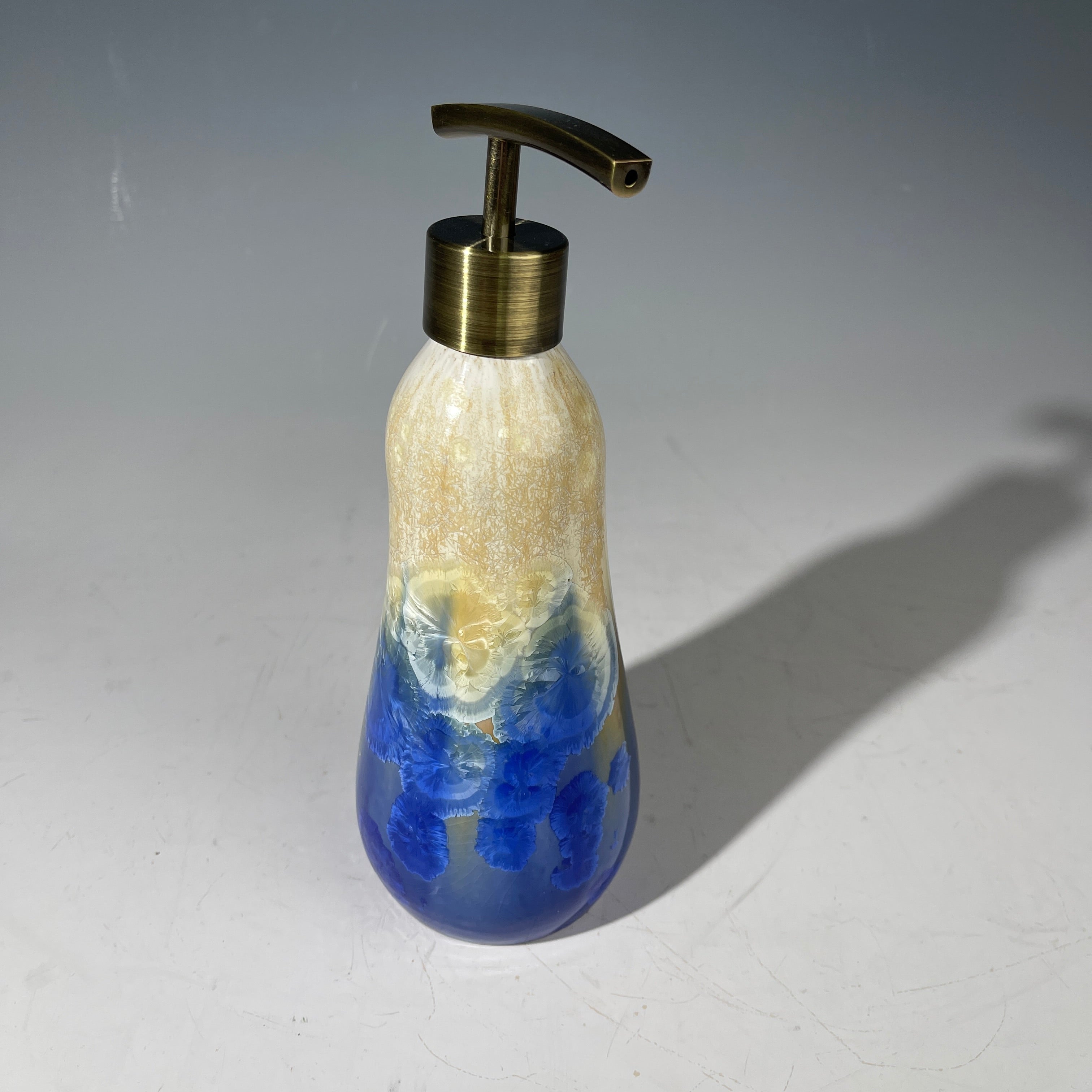 Soap pump dispenser in almond to cobalt