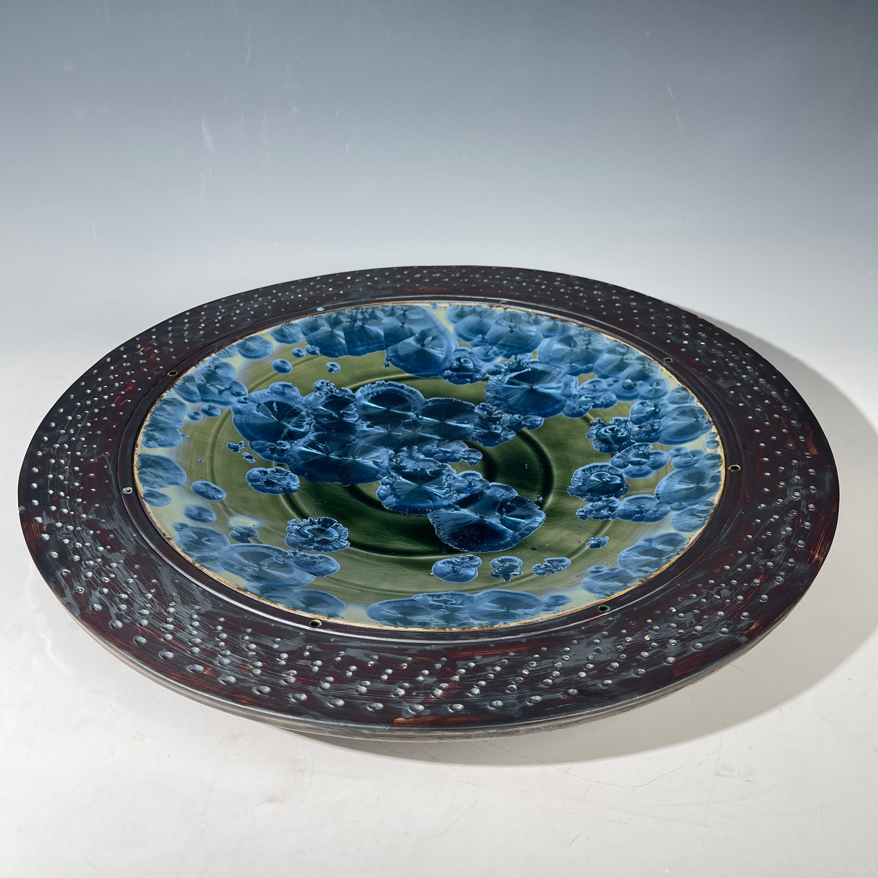 macro crystalline glazed hand made platter by Adam and hong Rubinstein olive to sparkling blue crystalline glazed