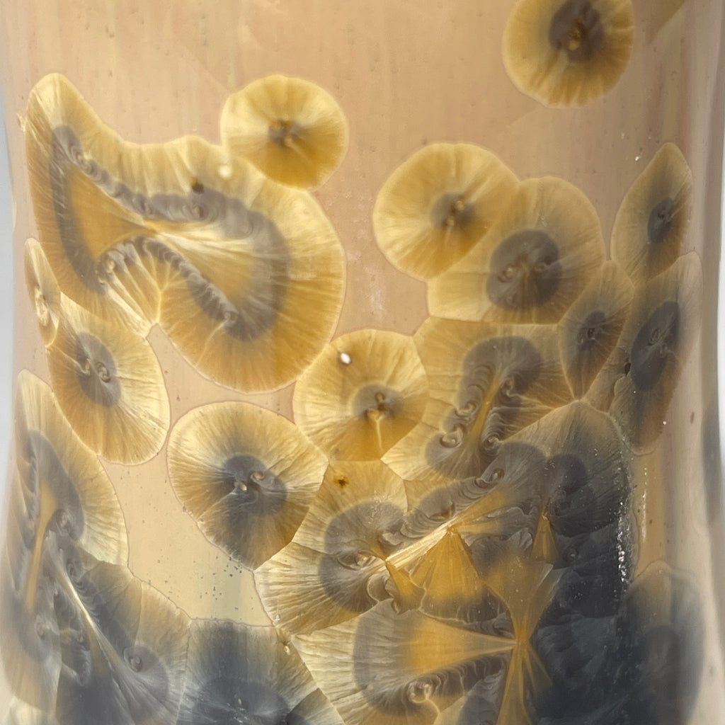 gold to charcoal soap pump is sparkling crystalline glaze close up