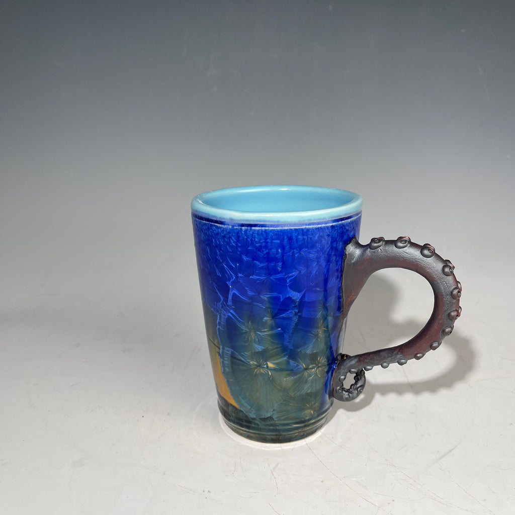 Octopus tentacle mug in cobalt macro crystalline glaze by Adam & Hong Rubinstein 