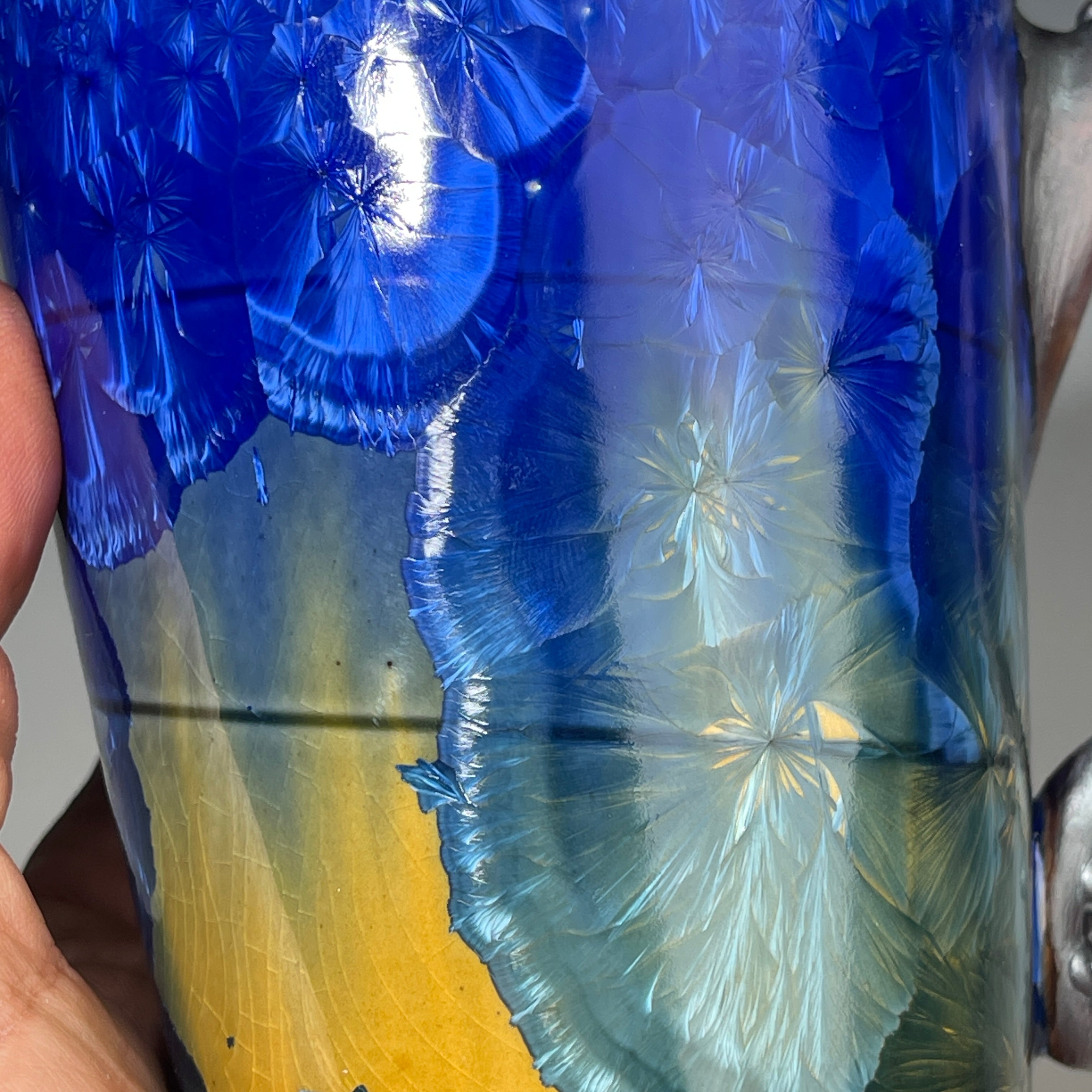 Octopus tentacle mug in cobalt macro crystalline glaze by Adam & Hong Rubinstein 
