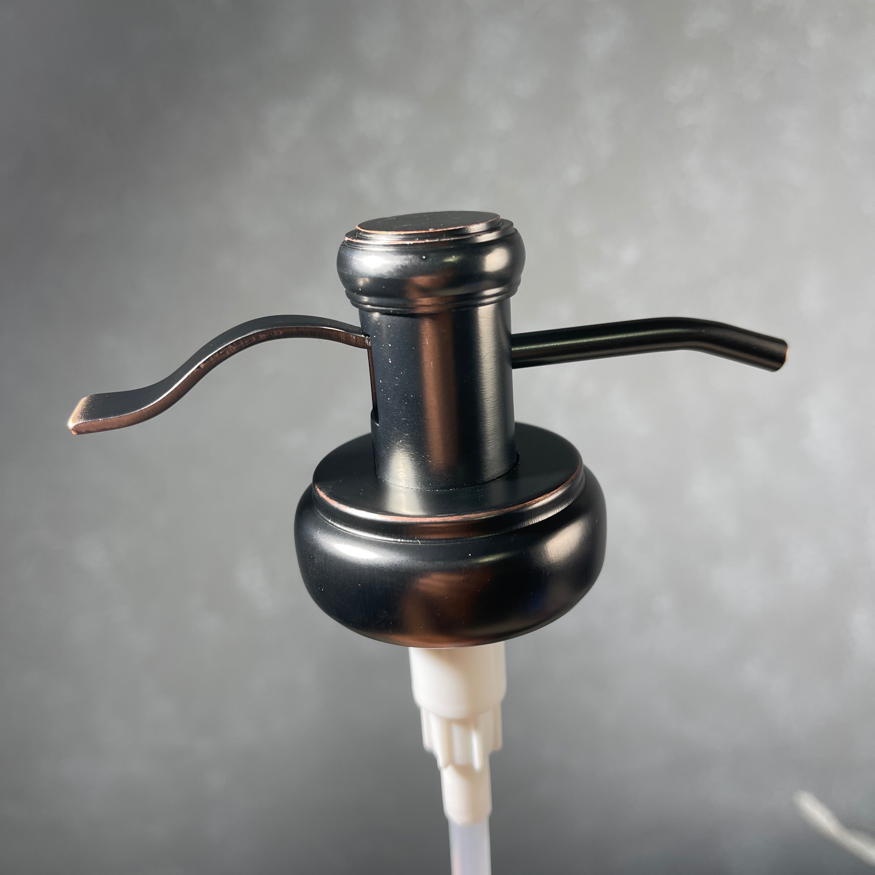 water well style soap pump in oil rubbed bronze finish
