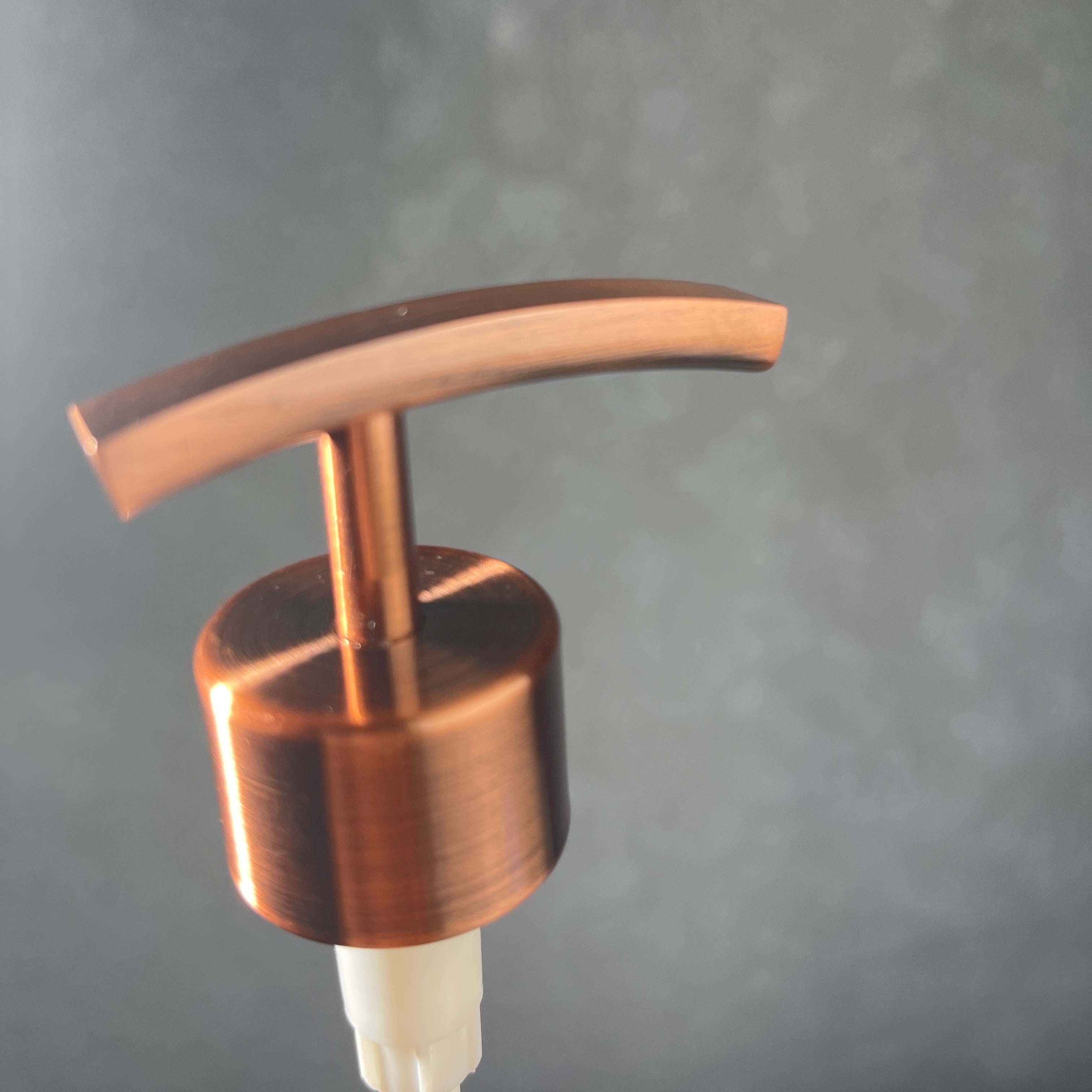 Copper finish metal soap pump top