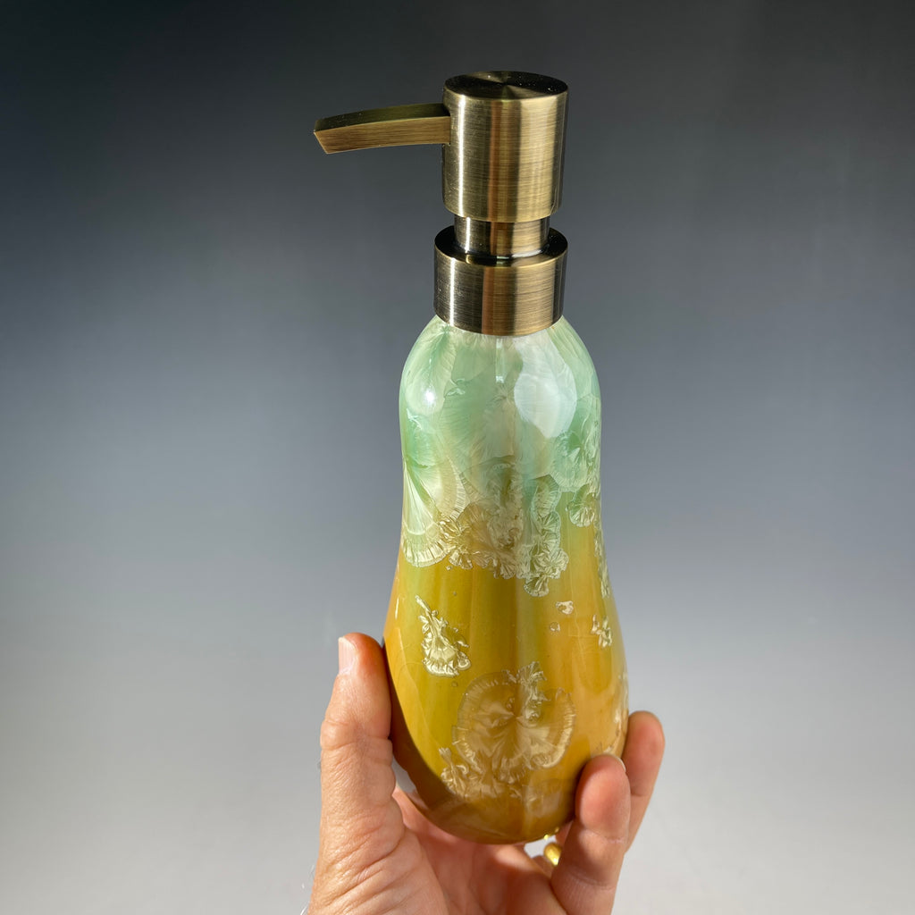 artistic soap dispenser in aqua fade to golden sunrise toned crystalline glaze