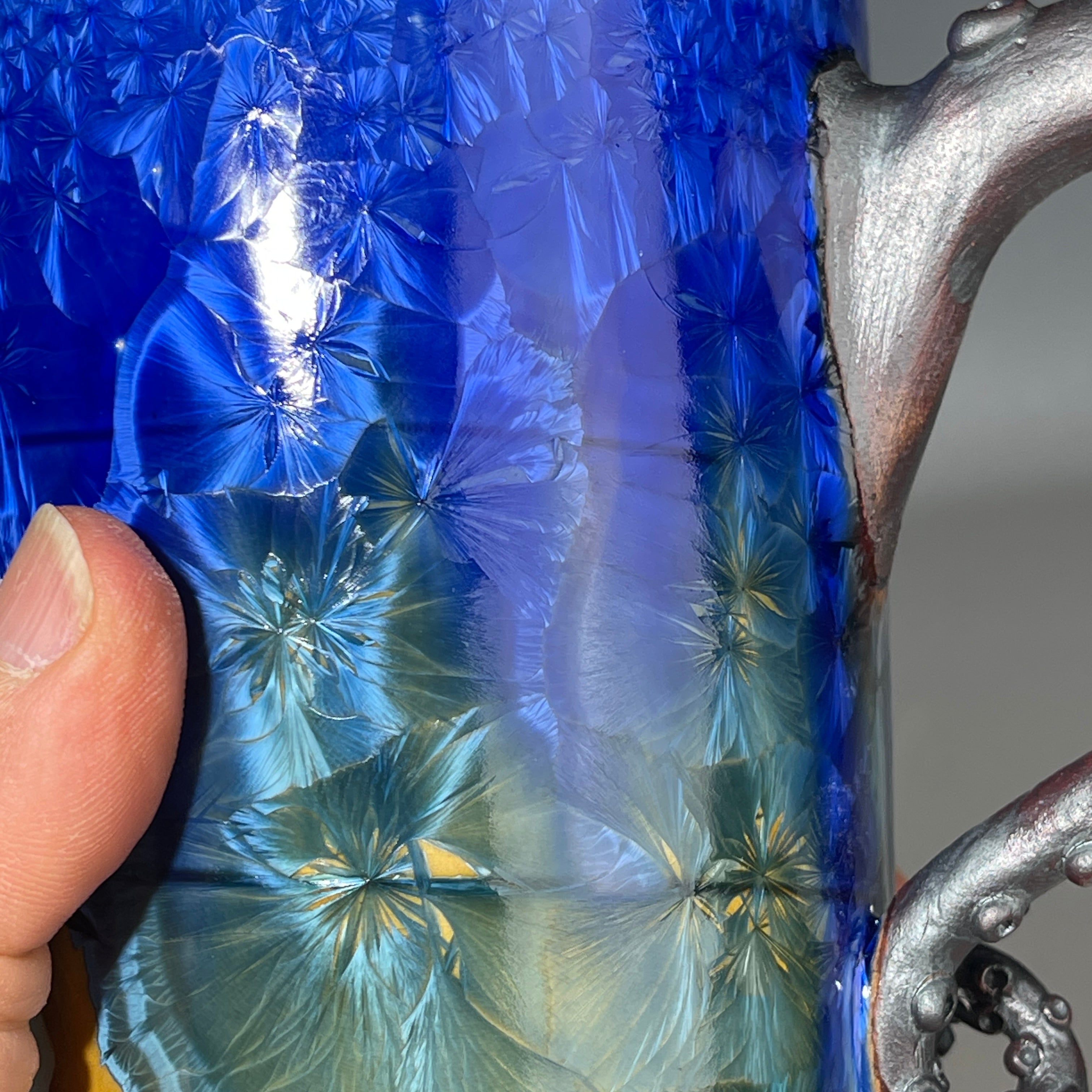 Octopus tentacle mug in cobalt macro crystalline glaze by Adam & Hong Rubinstein 