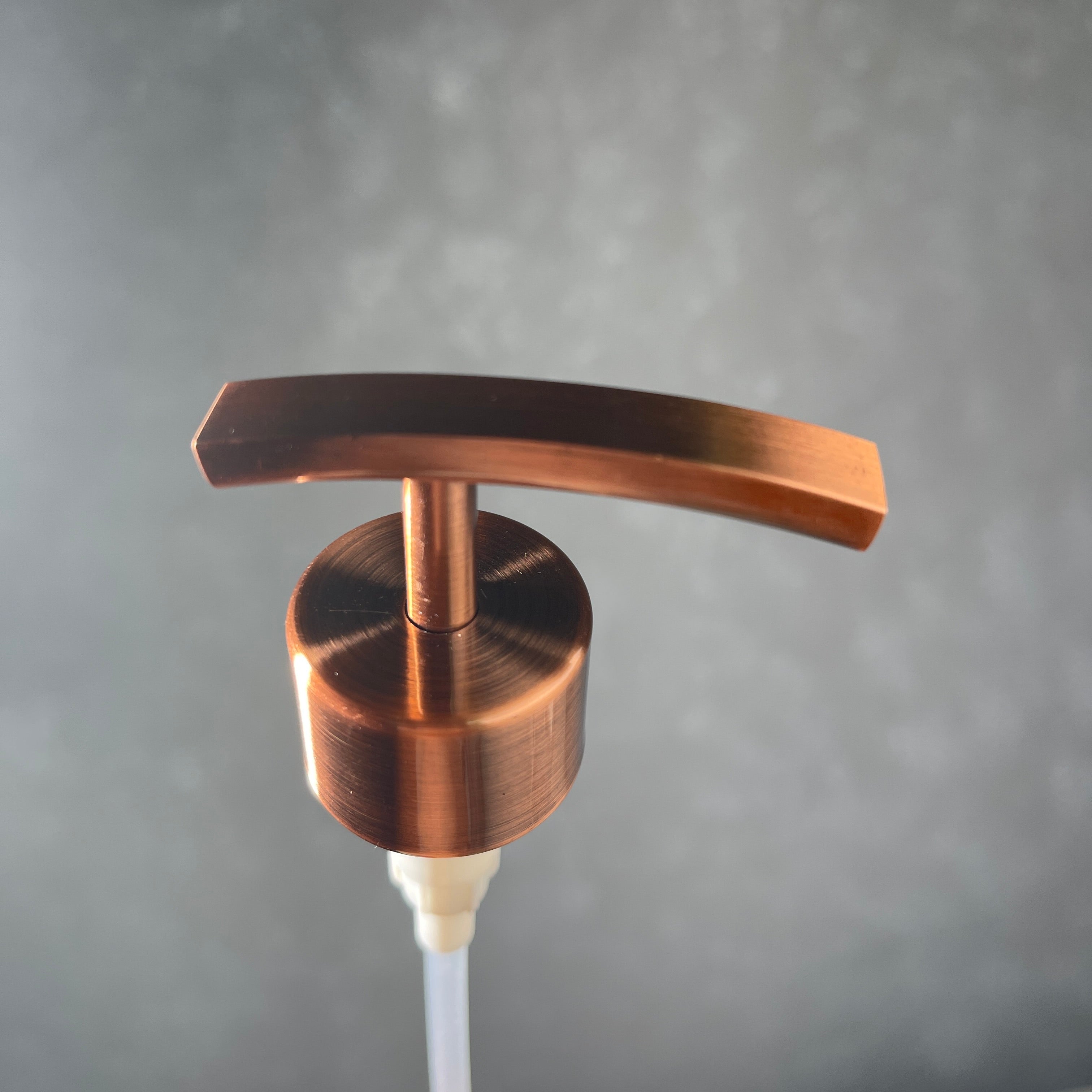 Copper finish metal soap pump top