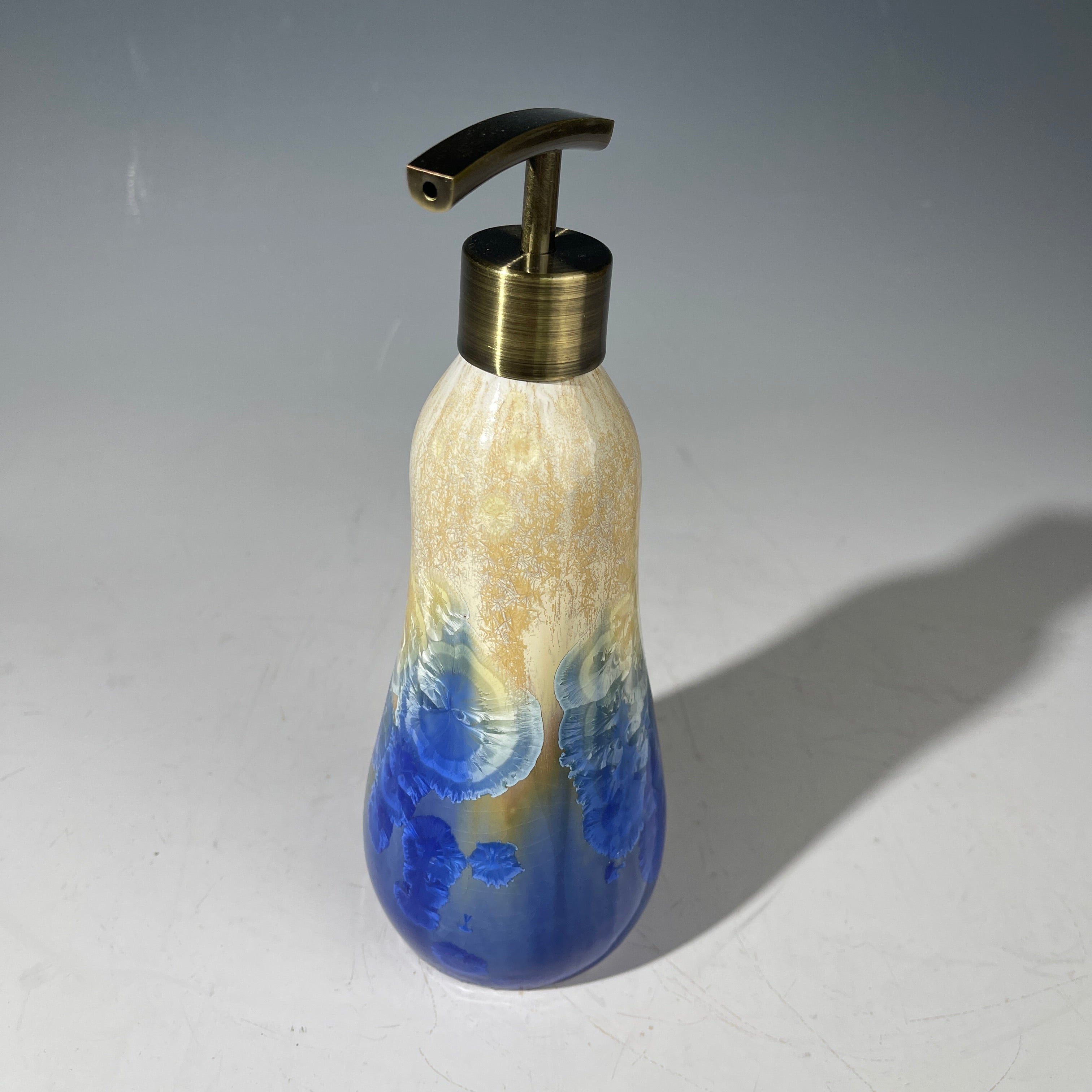 Soap pump dispenser in almond to cobalt