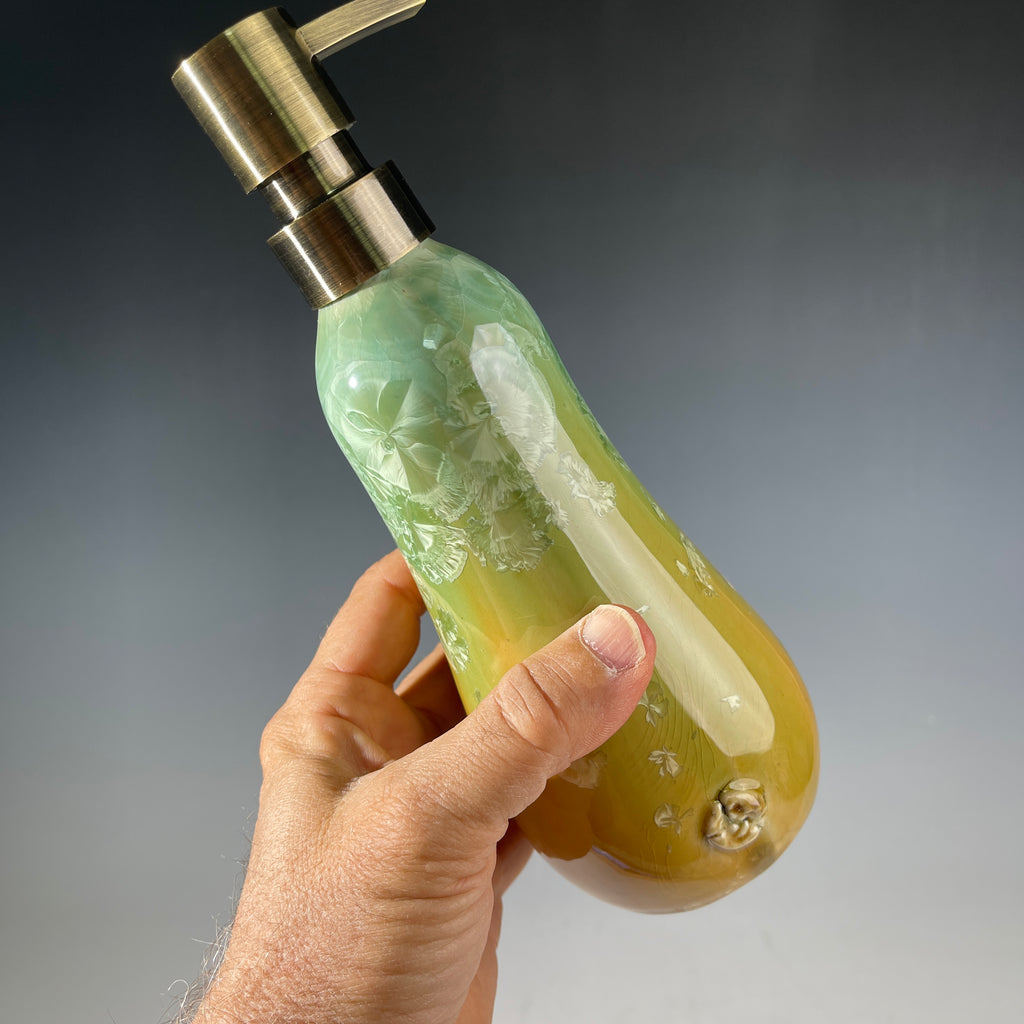artistic soap dispenser in aqua fade to golden sunrise toned crystalline glaze