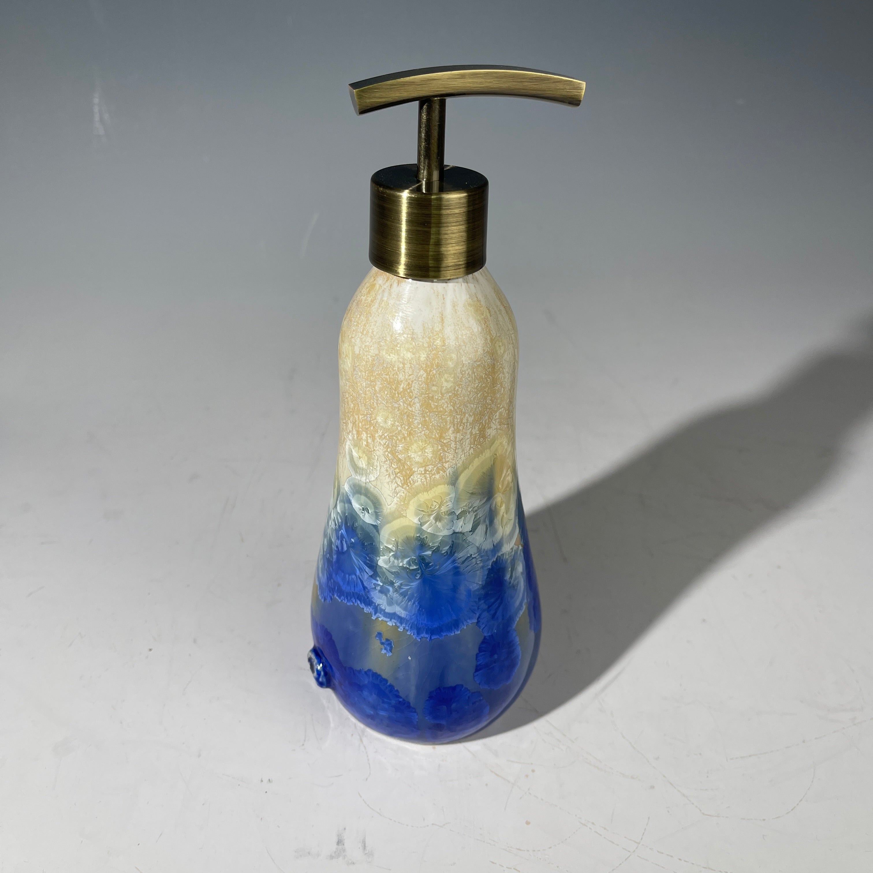 Soap pump dispenser in almond to cobalt