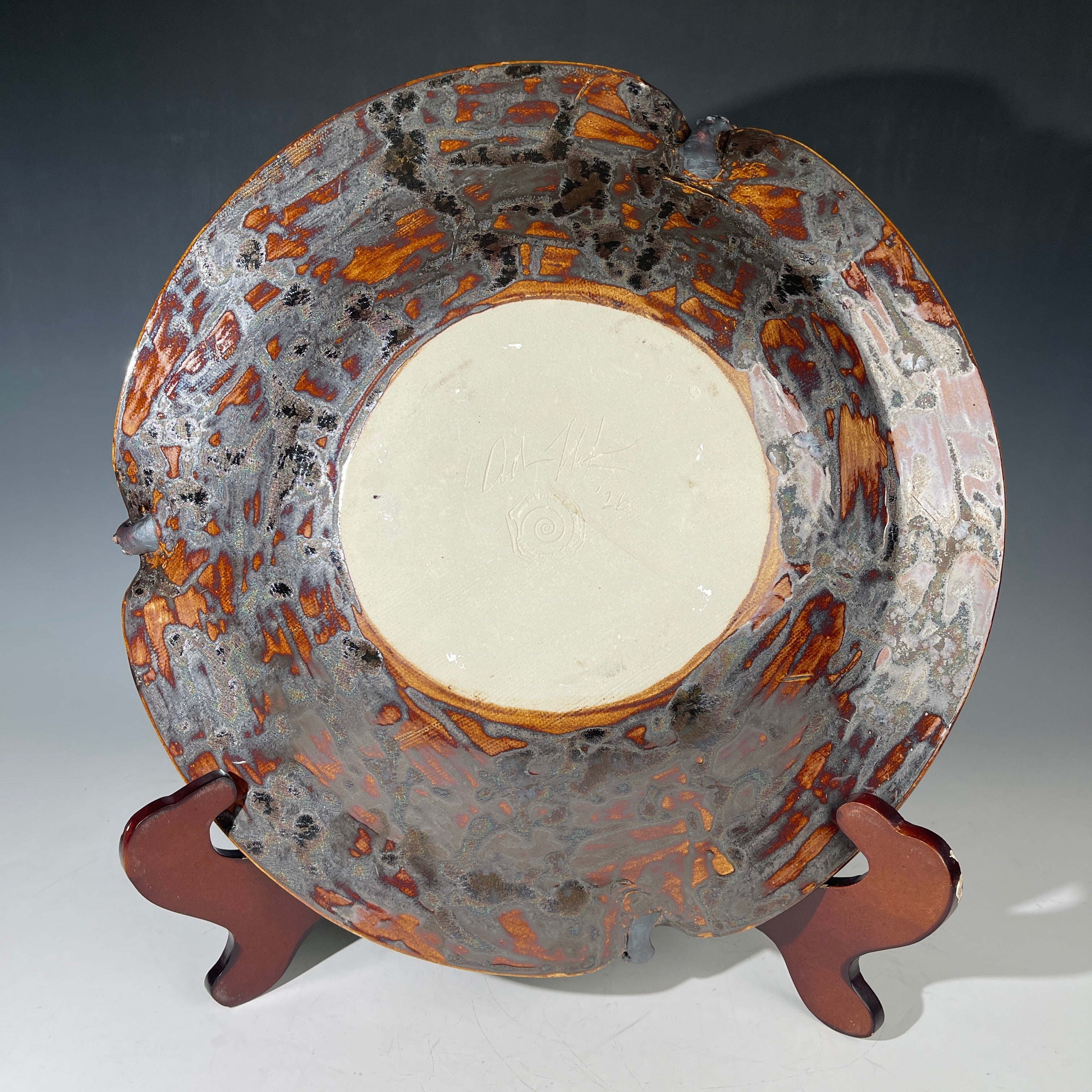 macrocrystalline glazed platter with tenticles backside