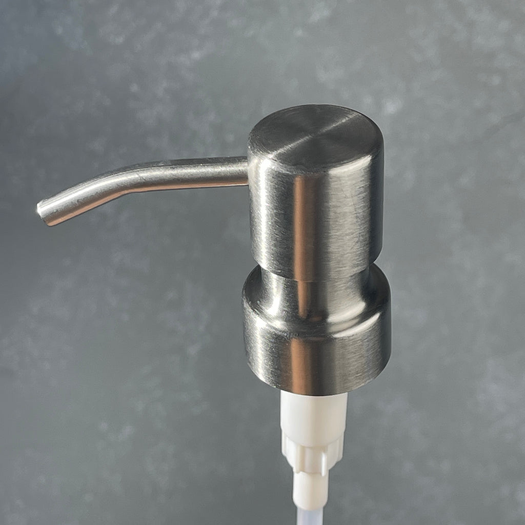 Stainless steel  ez pleaser soap dispenser on a gradiant background