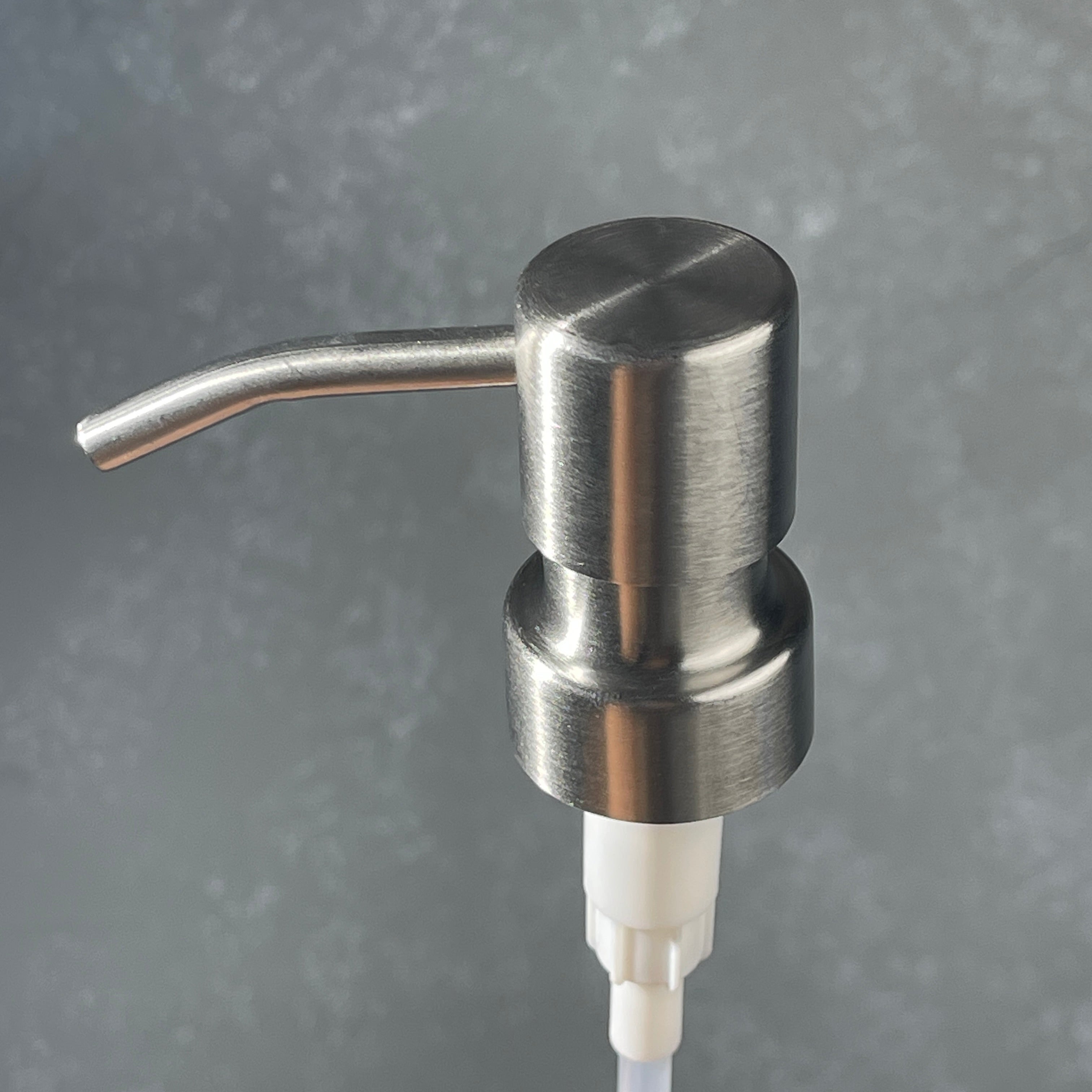 Stainless steel  ez pleaser soap dispenser on a gradiant background