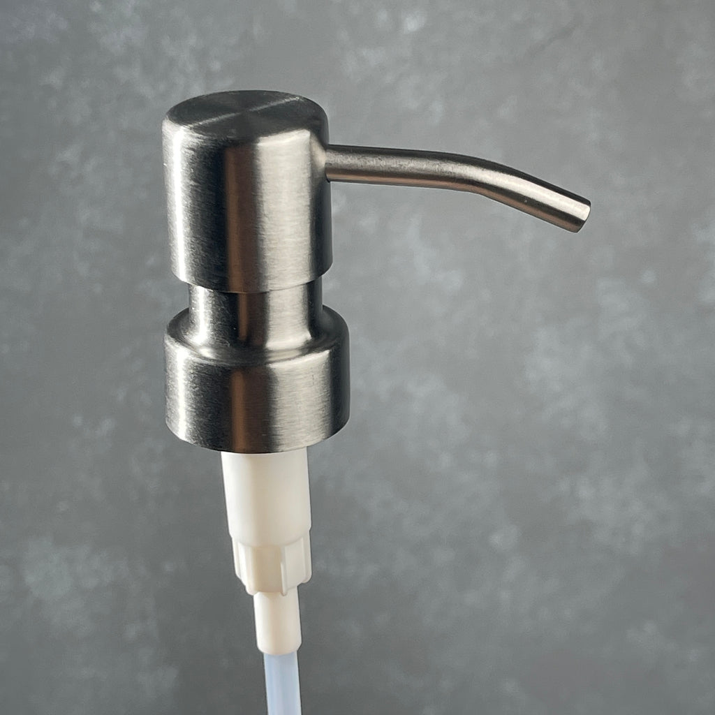 Stainless steel  ez pleaser soap dispenser on a gradiant background