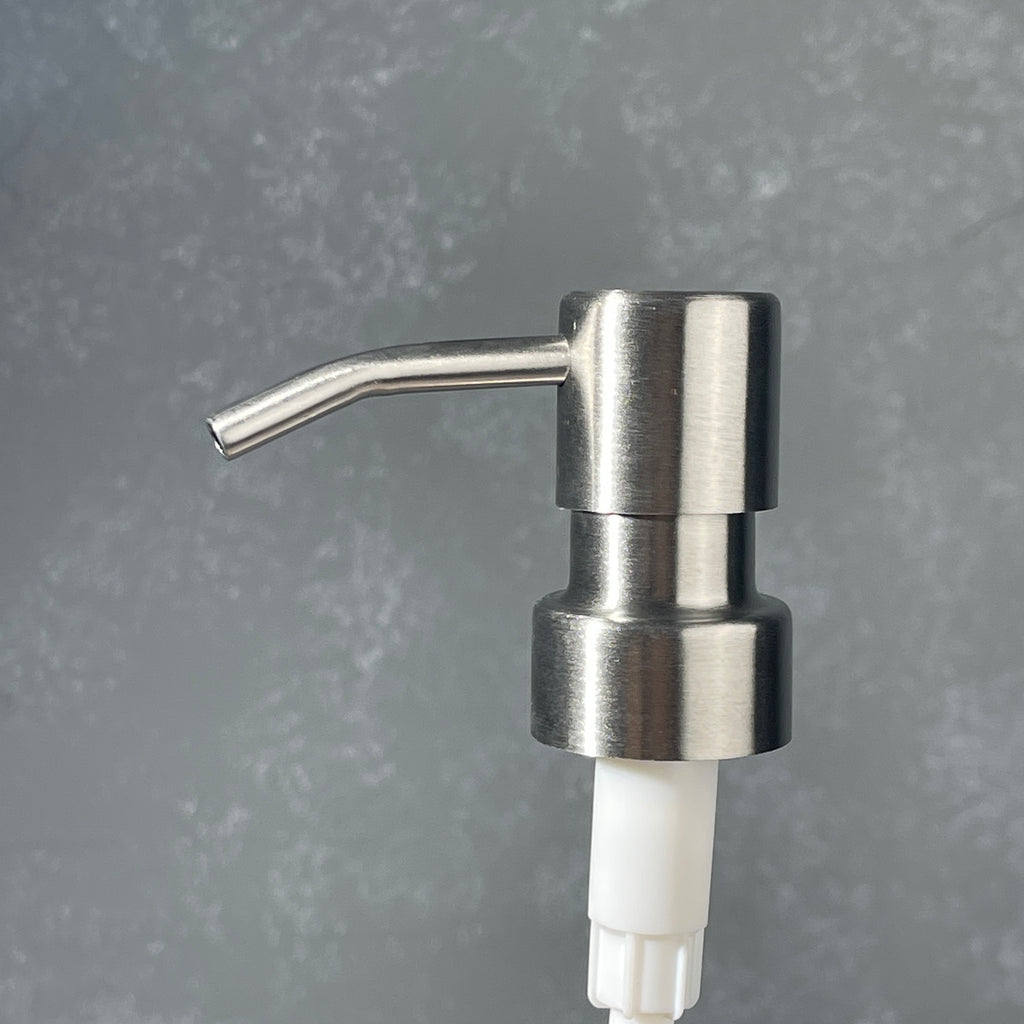 Stainless steel  ez pleaser soap dispenser on a gradiant background