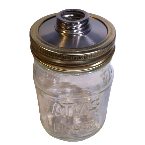 stainless steel adapter disk shown as used on top of a mason jar