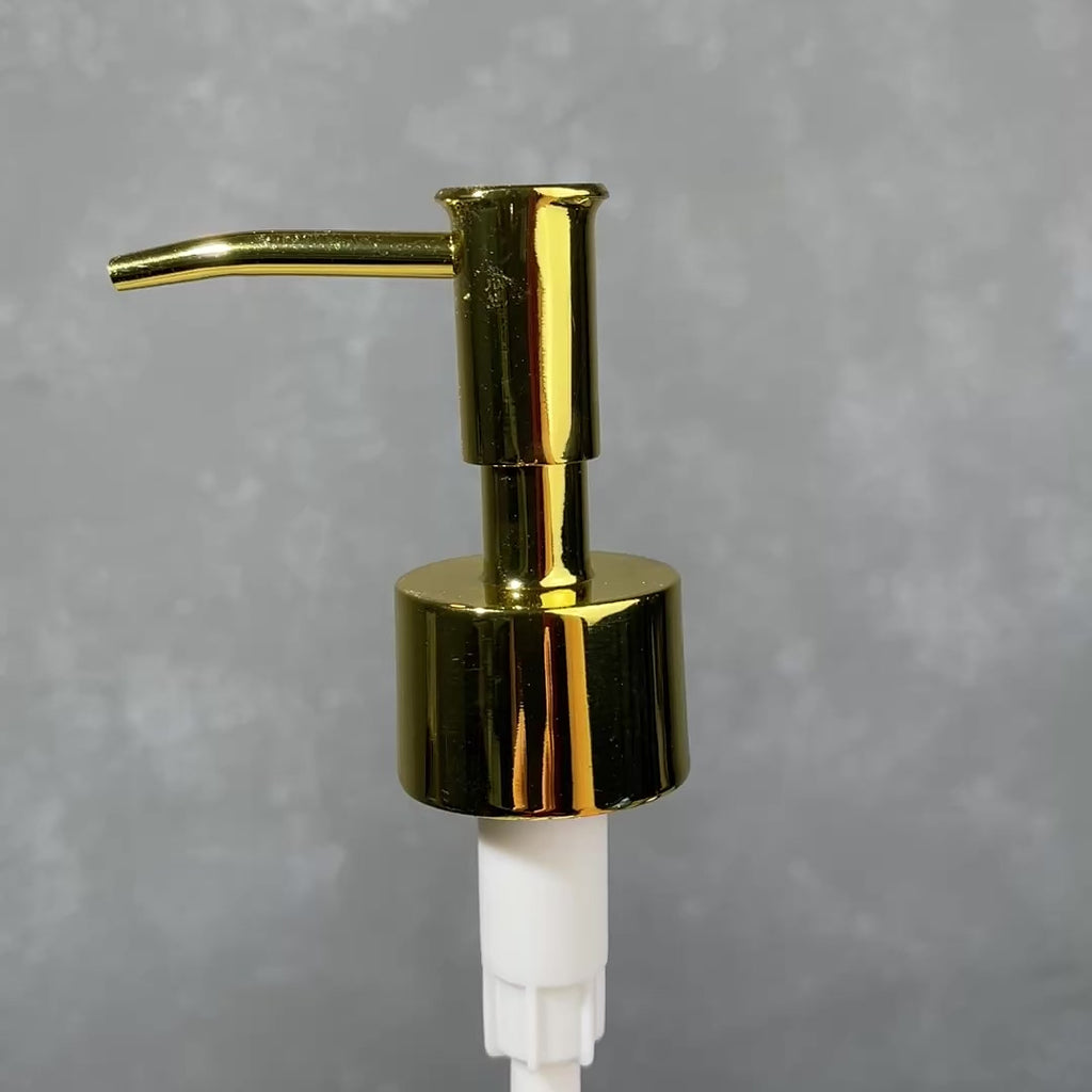 gold skinny head soap dispenser