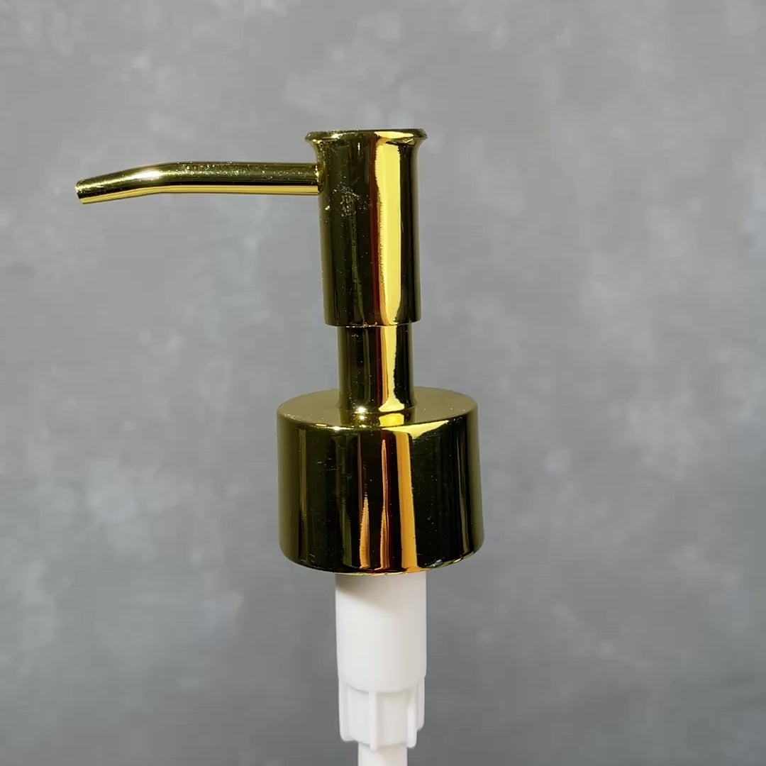 gold skinny head soap dispenser
