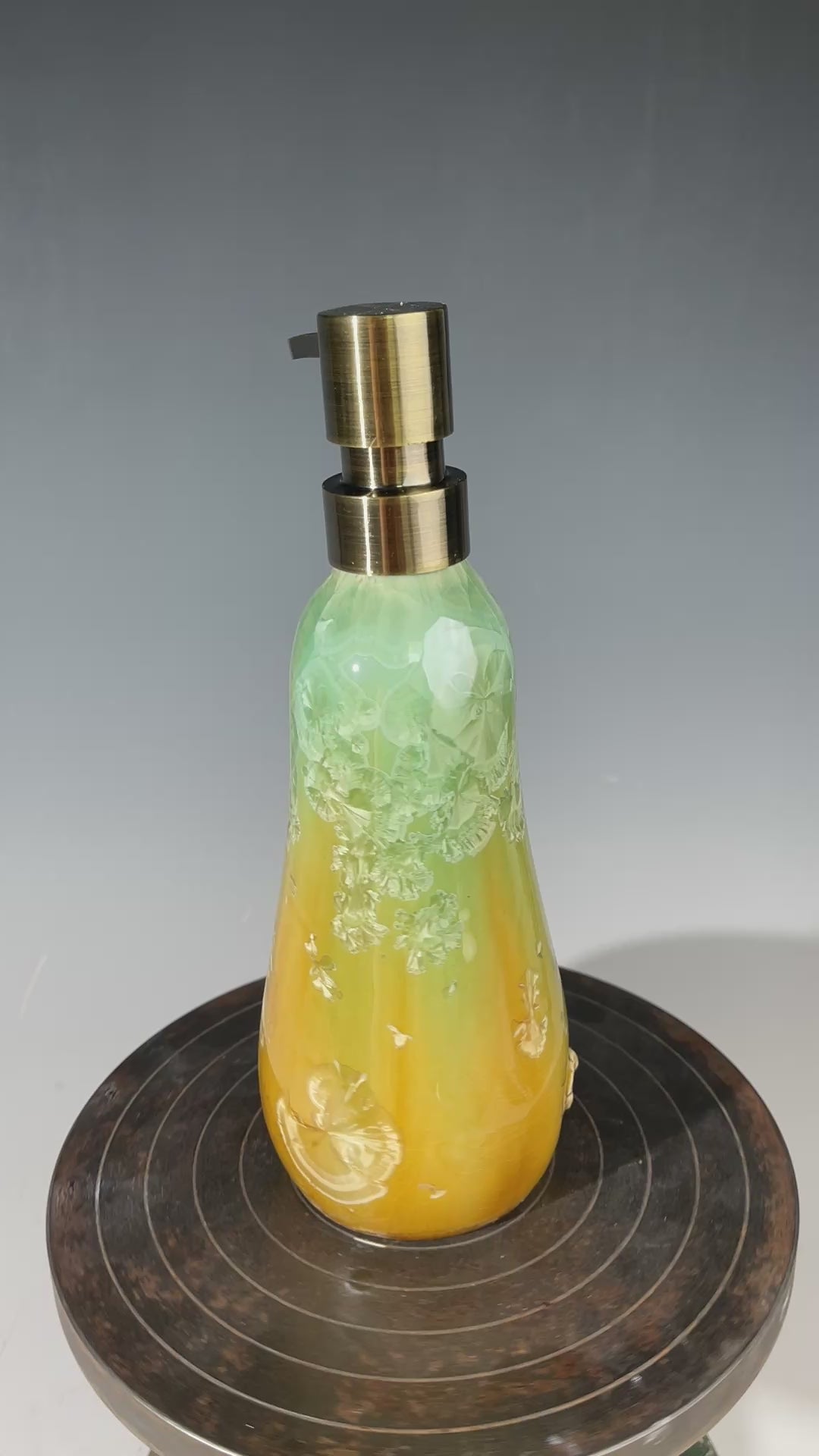 artistic soap dispenser in aqua fade to golden sunrise toned crystalline glaze