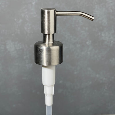 304 stainless  soap dispenser on a gray background